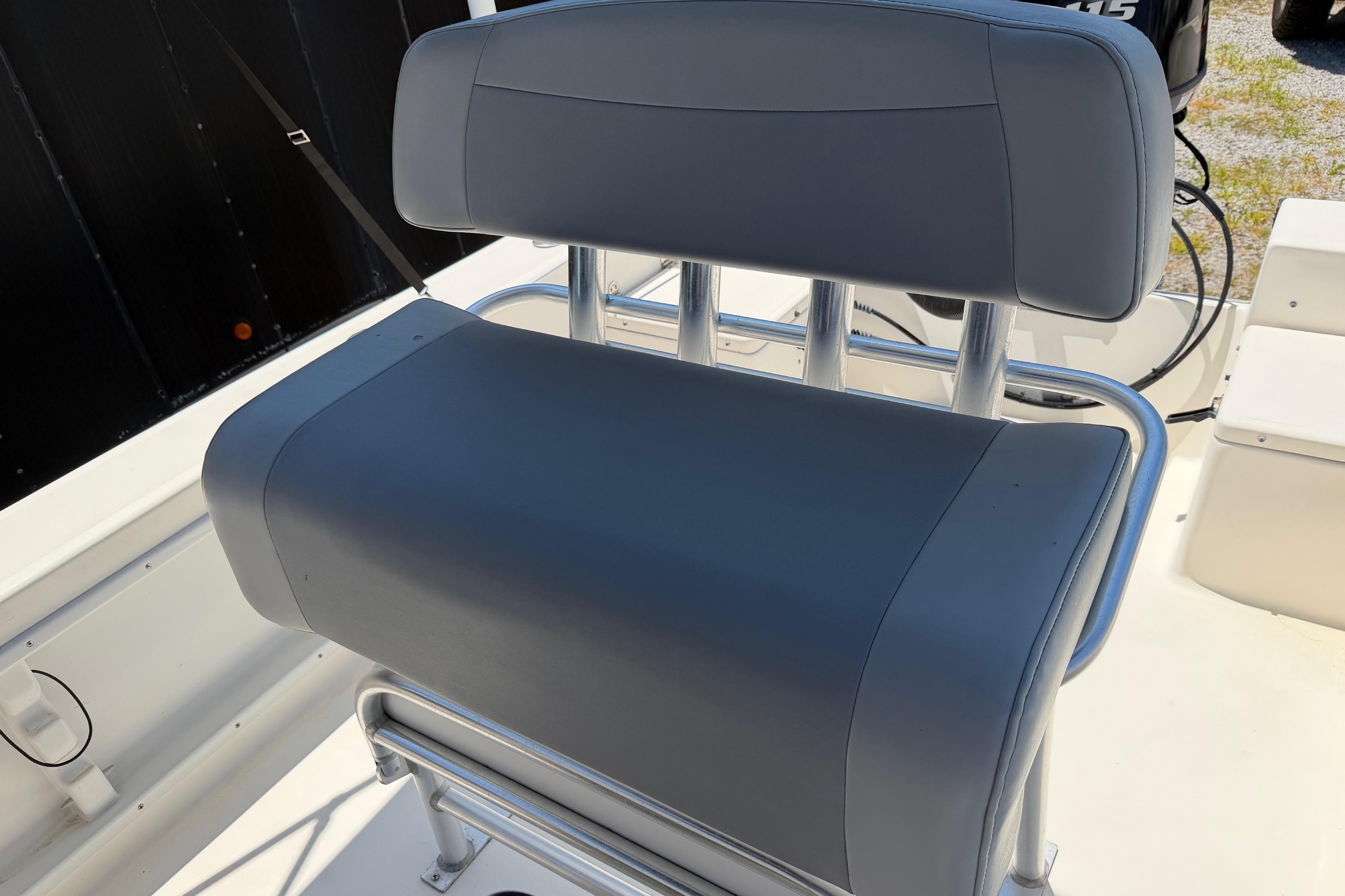 Gray cushioned seat on 2008 KenCraft Bay Rider 2060 boat, featuring sturdy metal frame.
