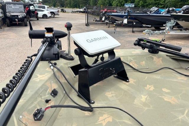 2017 Tracker Grizzly 1654 MVX Sportsman with Garmin GPS on deck.