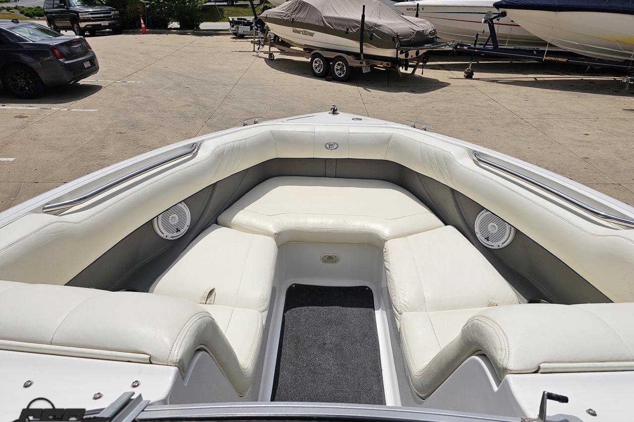 2010 Cobalt 232 WSS boat interior with white seating and speakers.