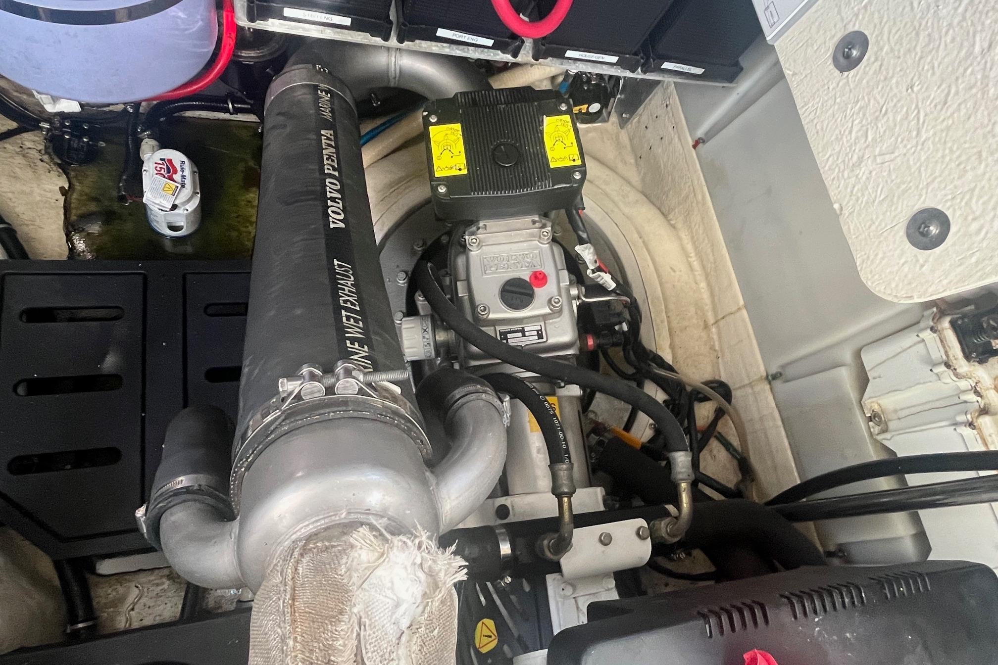 Engine compartment of a 2010 Monterey 400 Sport Yacht with Volvo Penta components.