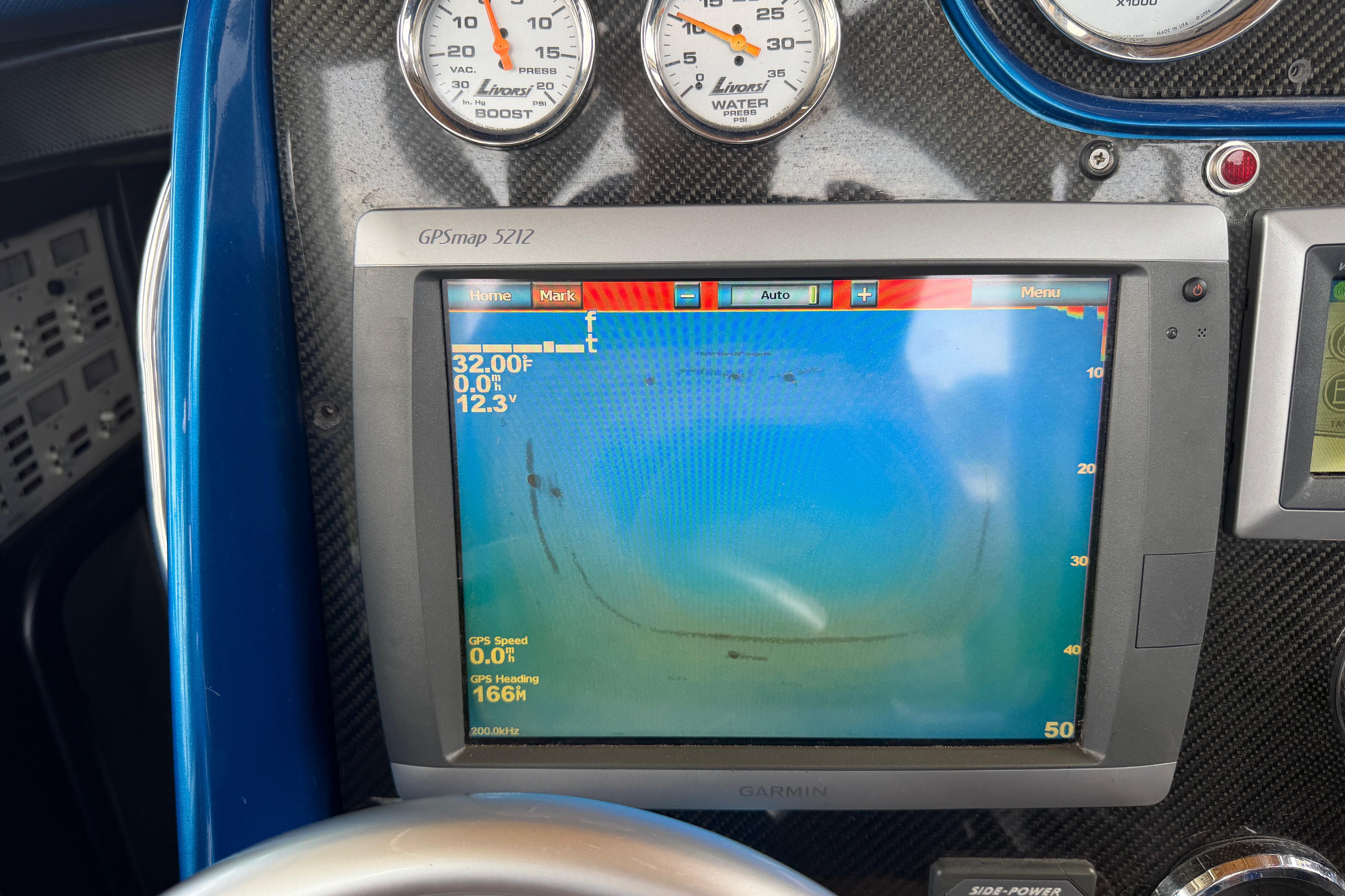 Garmin GPSmap 5212 display on 2013 Nor-Tech 477 SPX Vee Bottom dashboard.