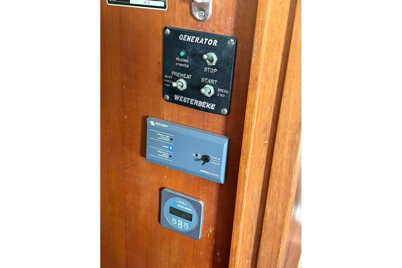 Control panel on 1987 Albin 36 Trawler with generator and battery indicators.