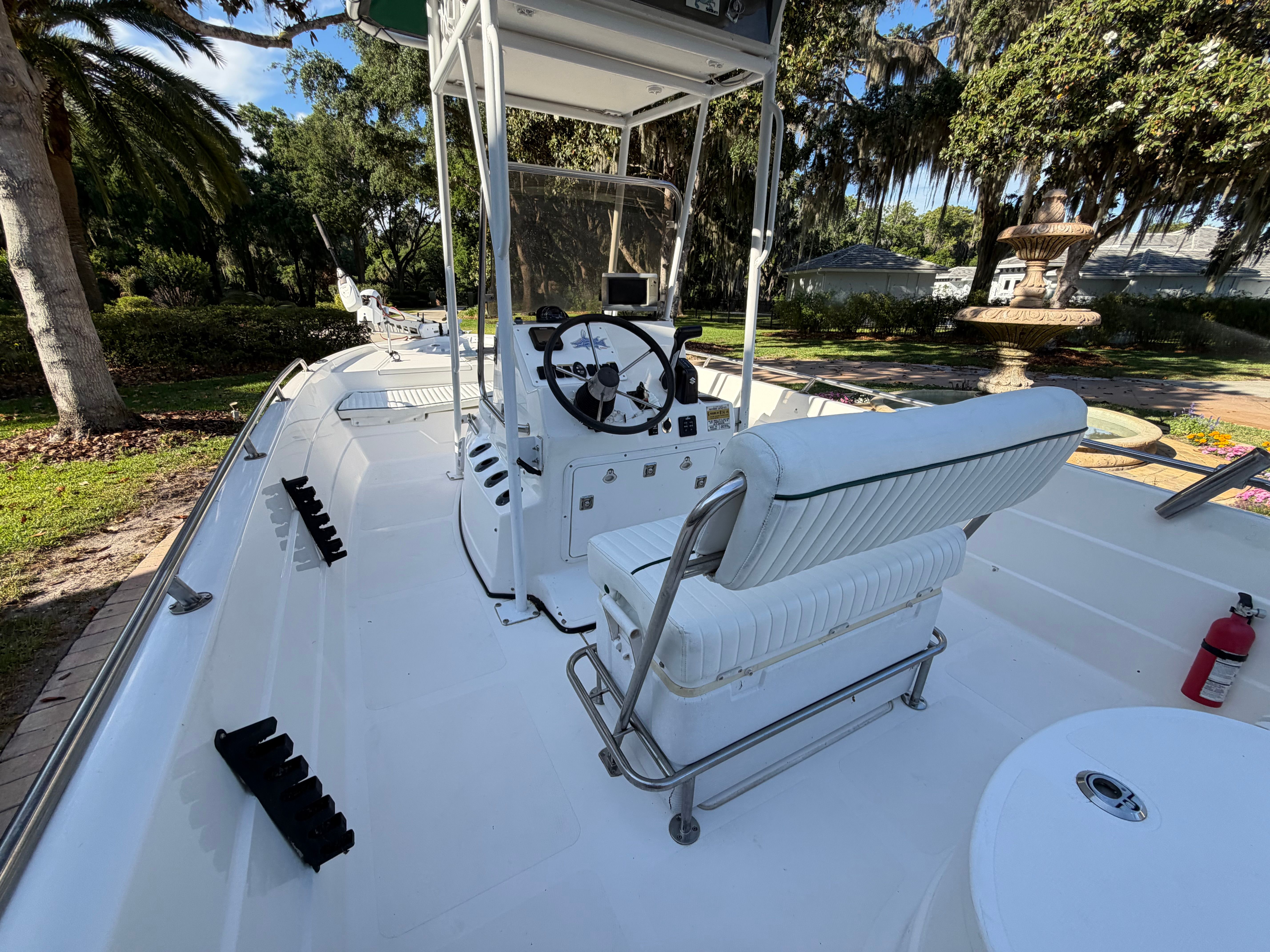 Interior view of a 1999 Skeeter ZX2200 boat with steering console.