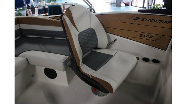 2025 Starcraft SVX 190 OB DC boat interior with cushioned seating and modern design.