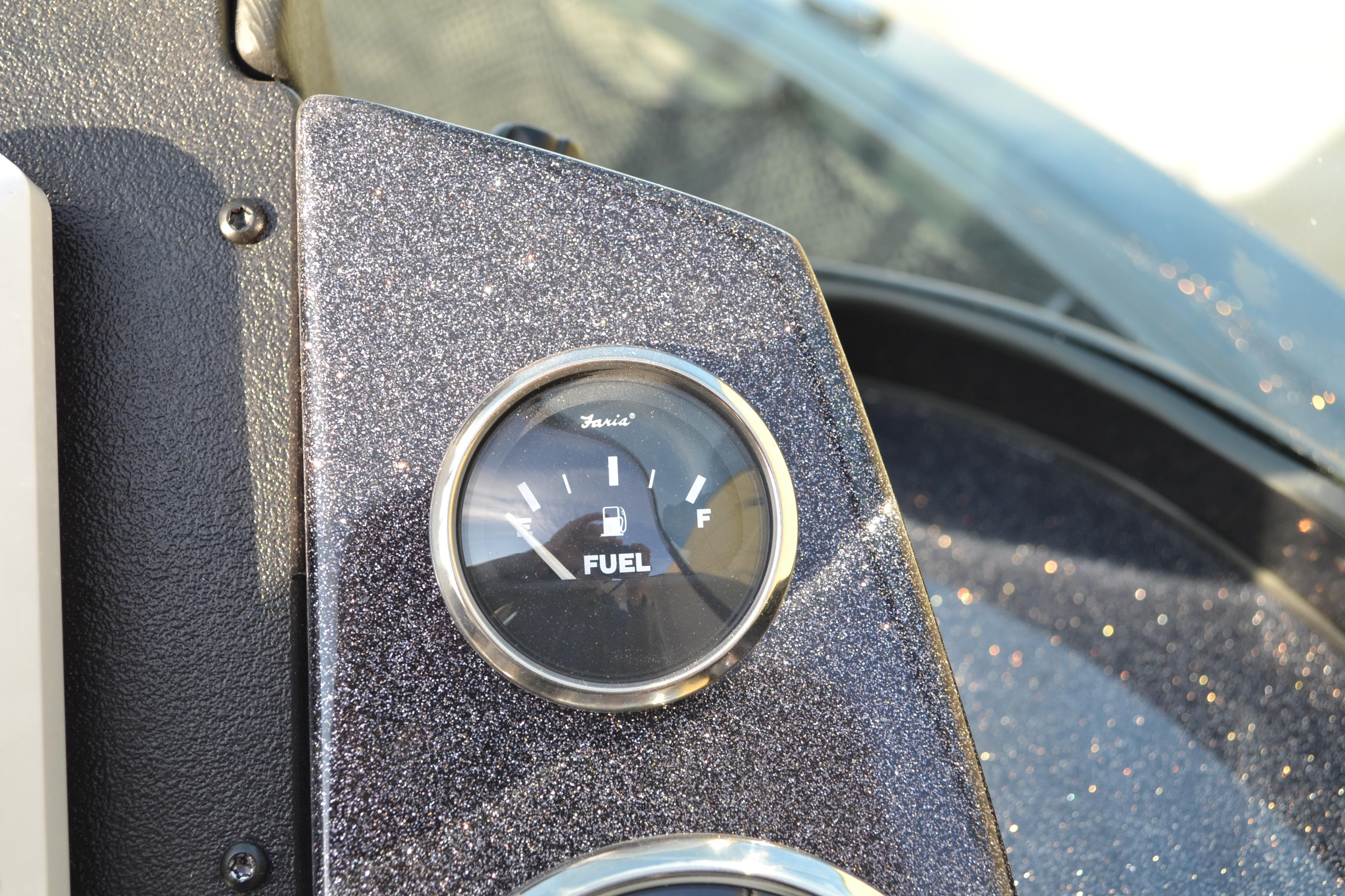 Fuel gauge on 2026 Ranger VS1882SC Reata boat dashboard, showing low fuel level.