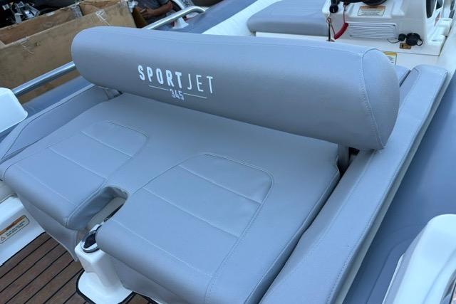 2018 Williams 345 Sports Jet with gray seating and "SportJet 345" branding.