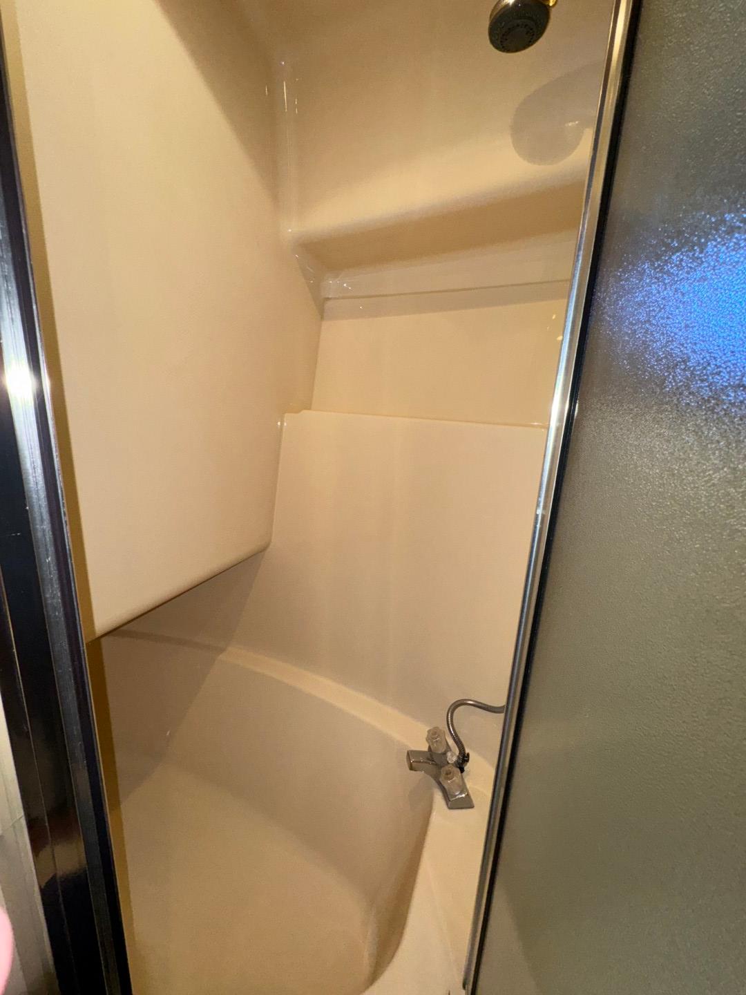 Shower area inside a 2003 Meridian 381 Sedan boat.