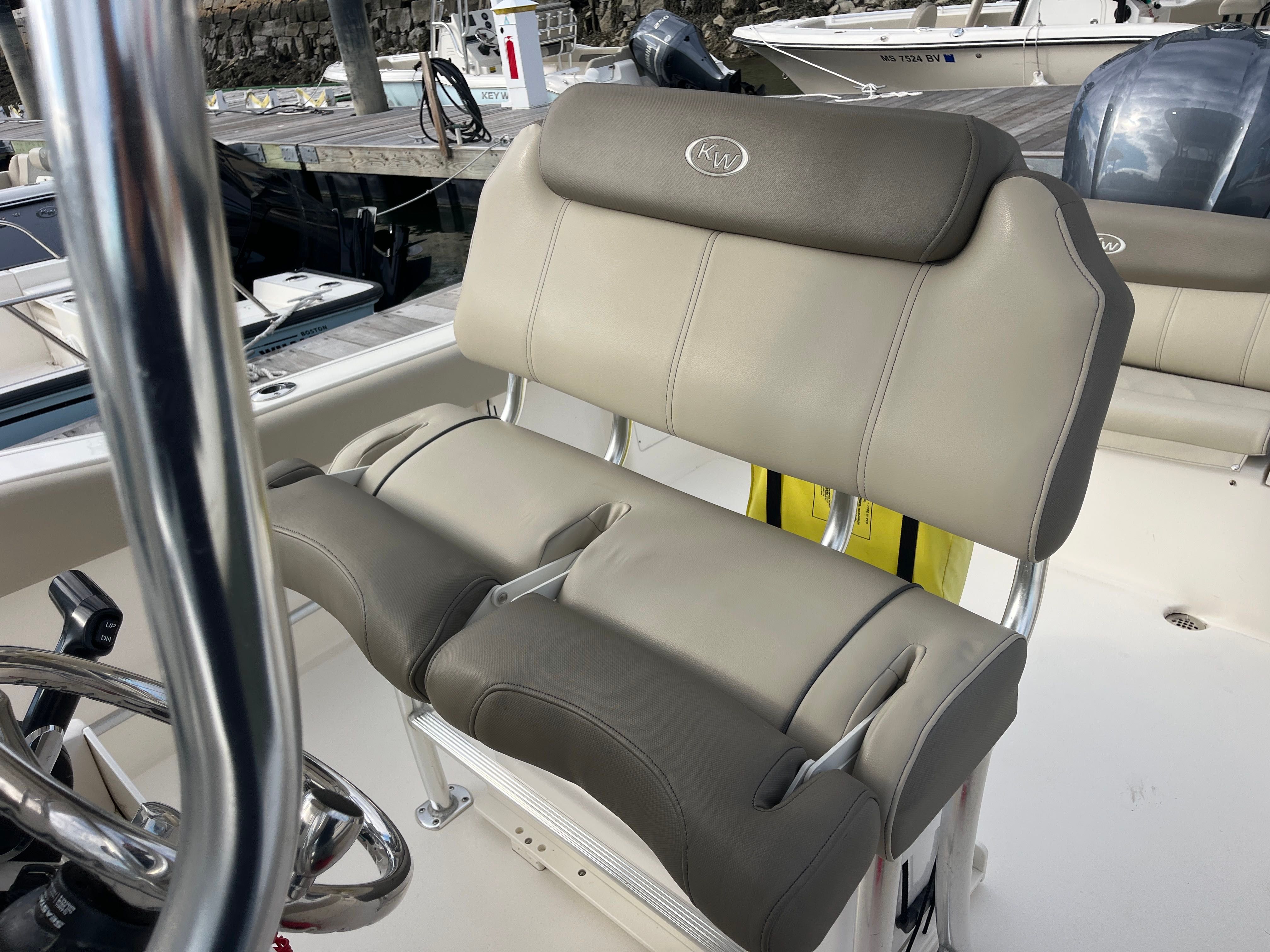2024 Key West 239 FS boat seat with gray upholstery.