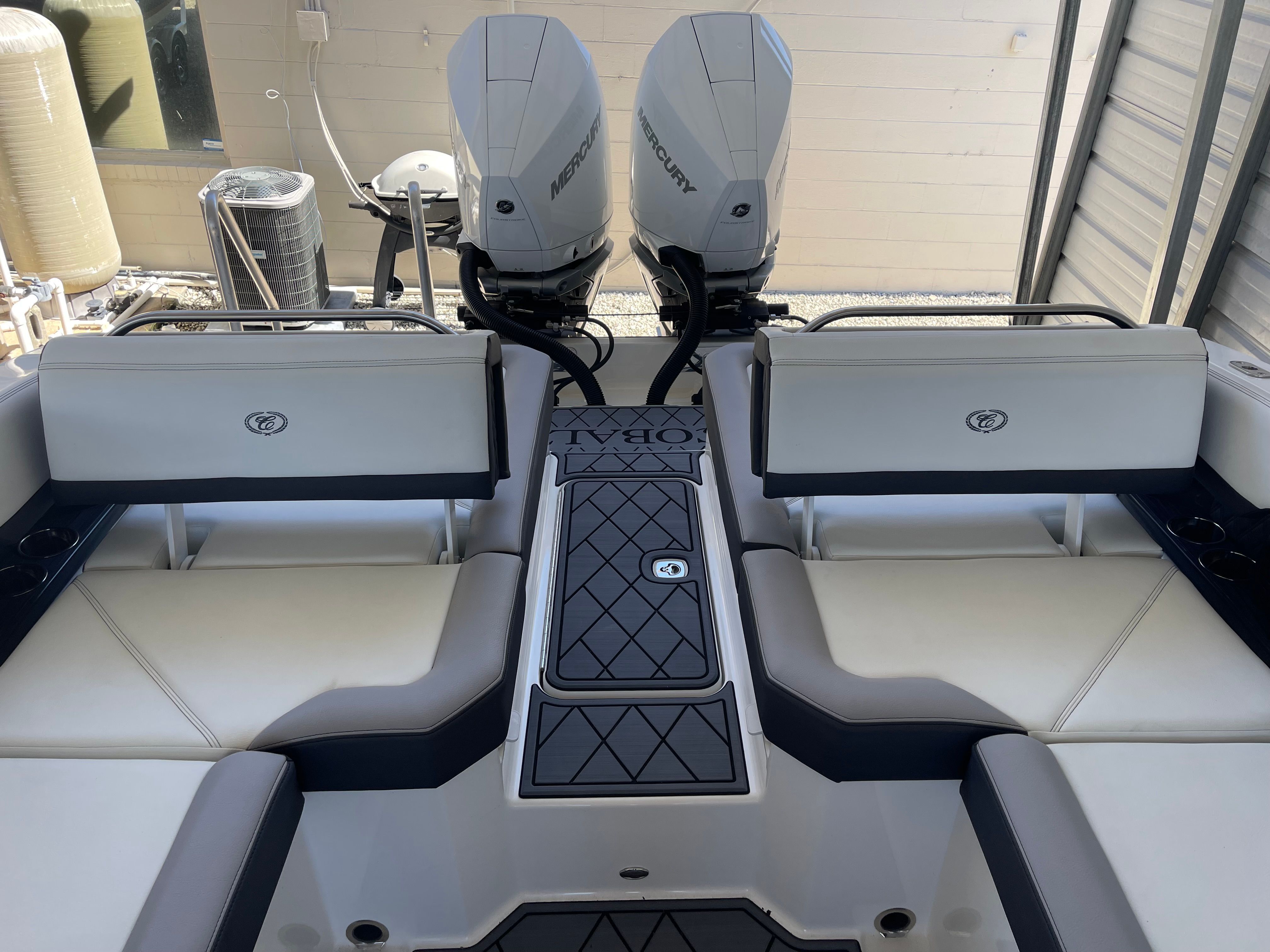 Interior view of a 2022 Cobalt R8 Outboard boat with Mercury engines.