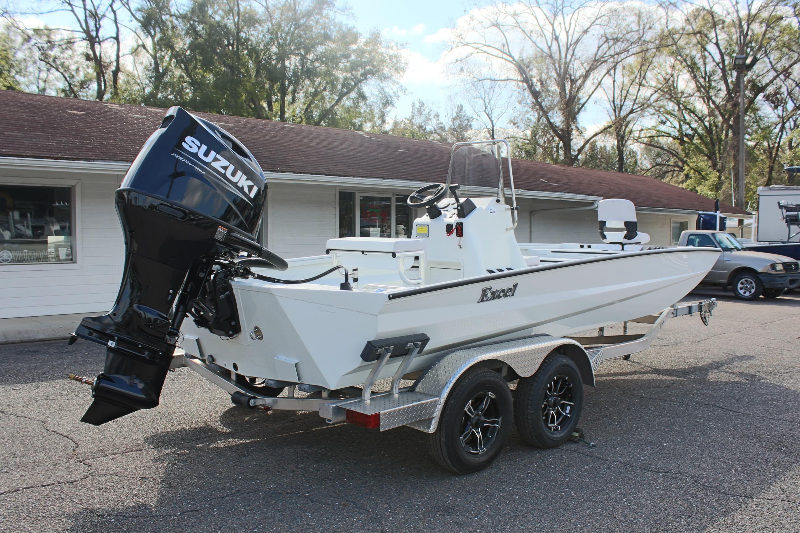 2025 Excel 2172 Stalker CC boat with Suzuki outboard motor on trailer.