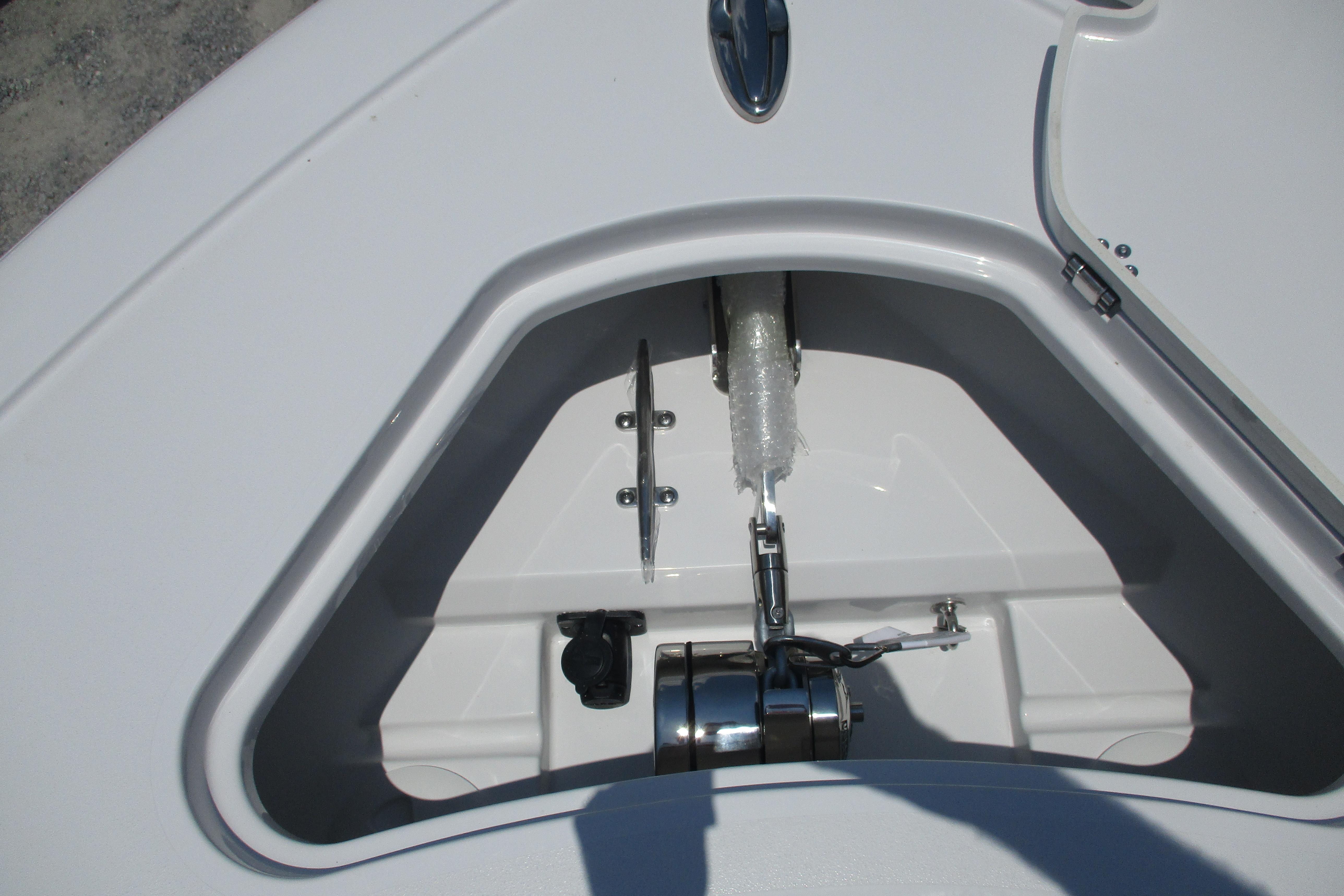 Anchor compartment of 2027 Sportsman Open 252 Center Console boat, showcasing storage and hardware.