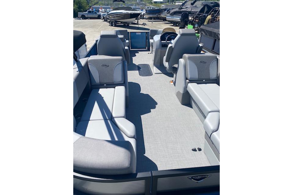2026 Manitou 23 AURORA RF VPII 575 pontoon boat interior with spacious seating.