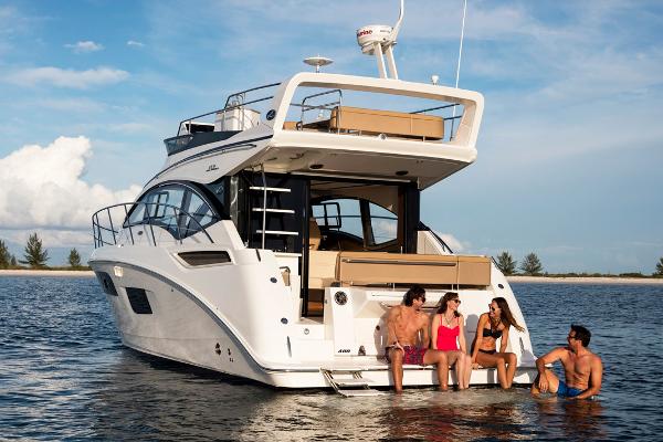 Manufacturer Provided Image: 2016 Sea Ray 400 Fly yacht with people enjoying the water.