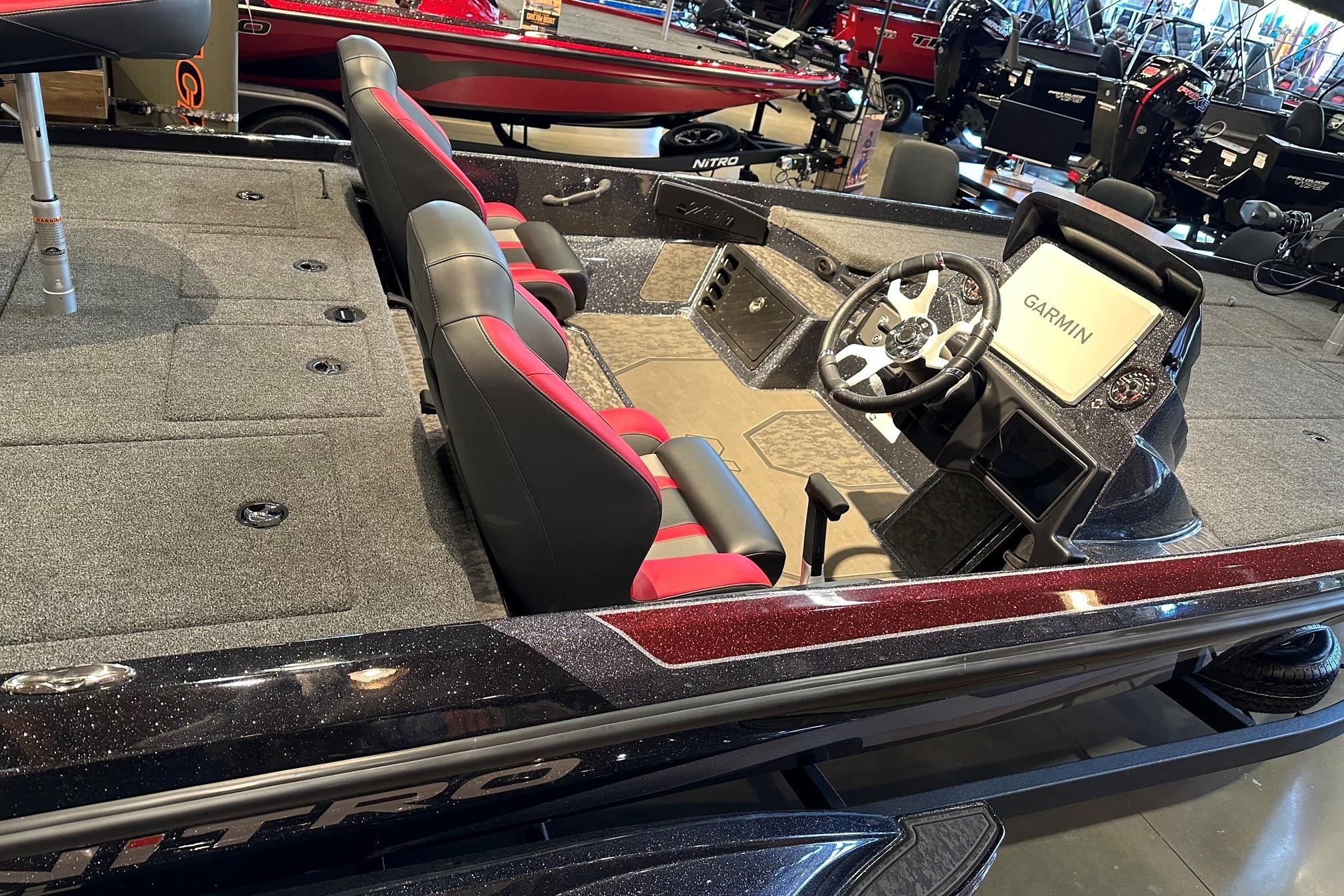 2026 Nitro Z21 XL Pro boat interior with Garmin navigation system and sleek seating.