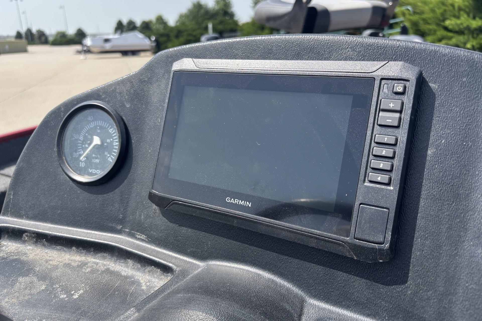 Dashboard of a 2019 Lowe Skorpion 17 boat featuring a Garmin display and VDO gauge.