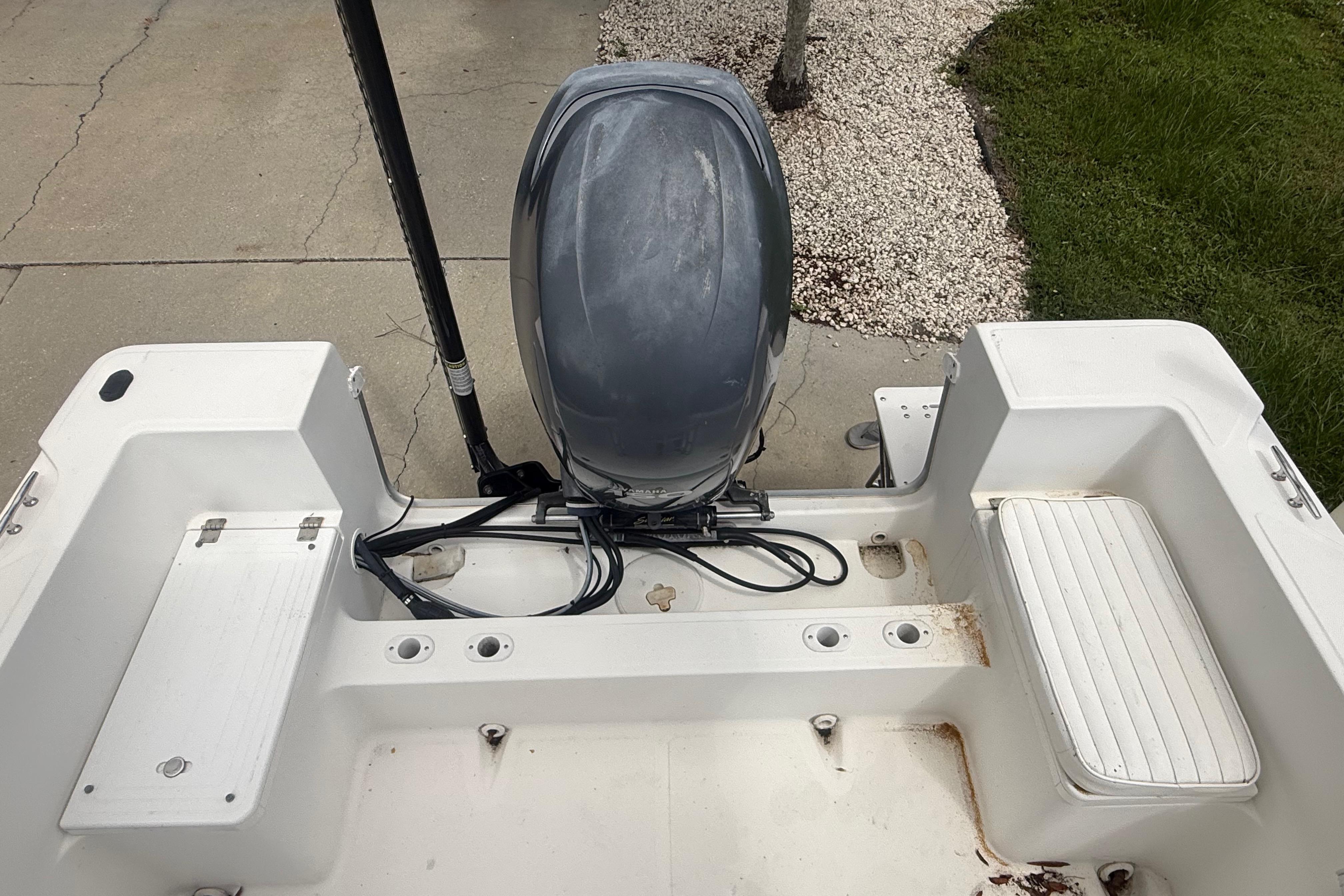 Clearwater 2000 Center Console boat, 2012 model, with outboard motor.