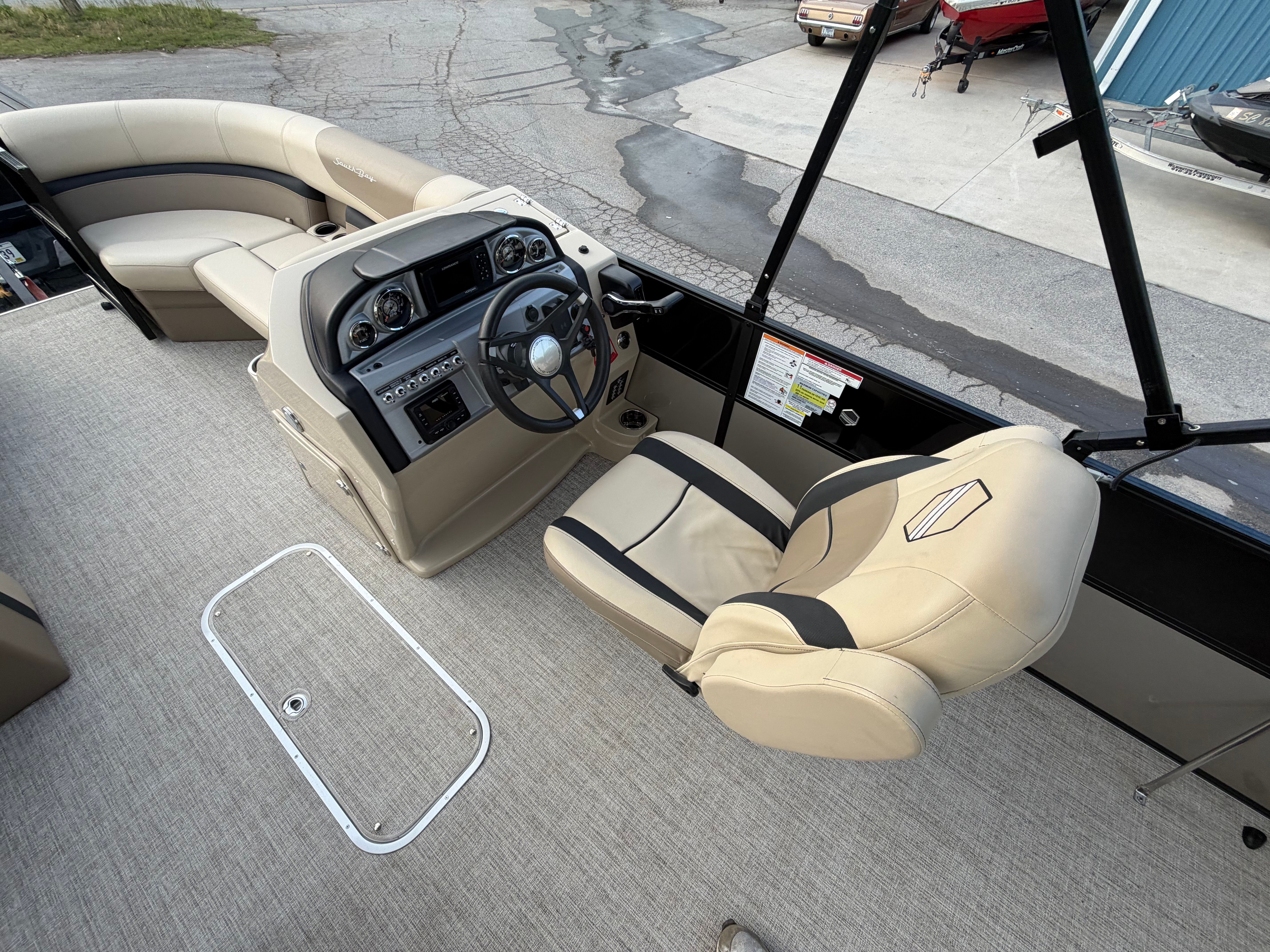 Interior of a 2023 South Bay S222 CR2 pontoon boat.