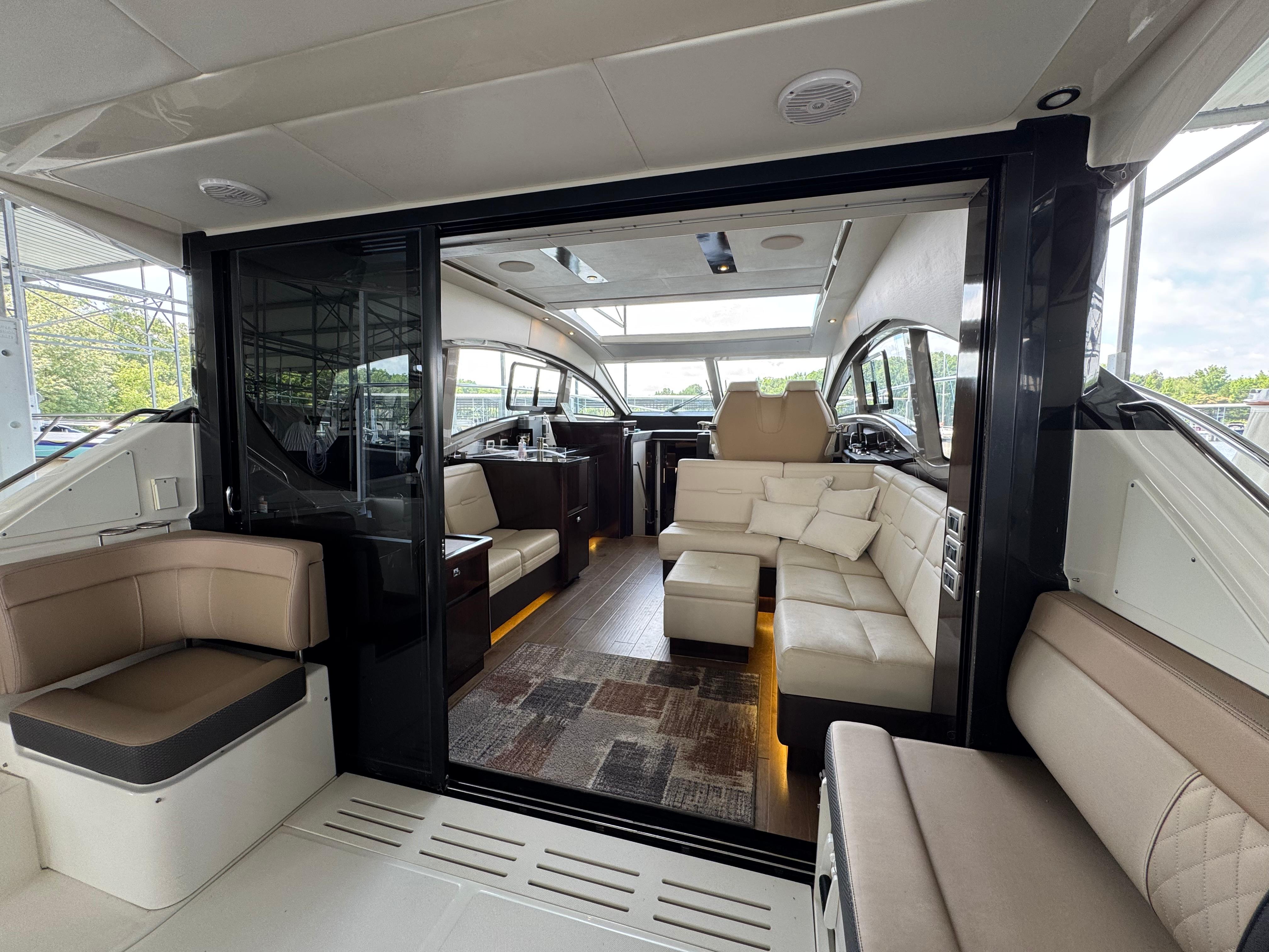 Luxurious interior of 2017 Sea Ray Sundancer 400 yacht with plush seating and modern design.
