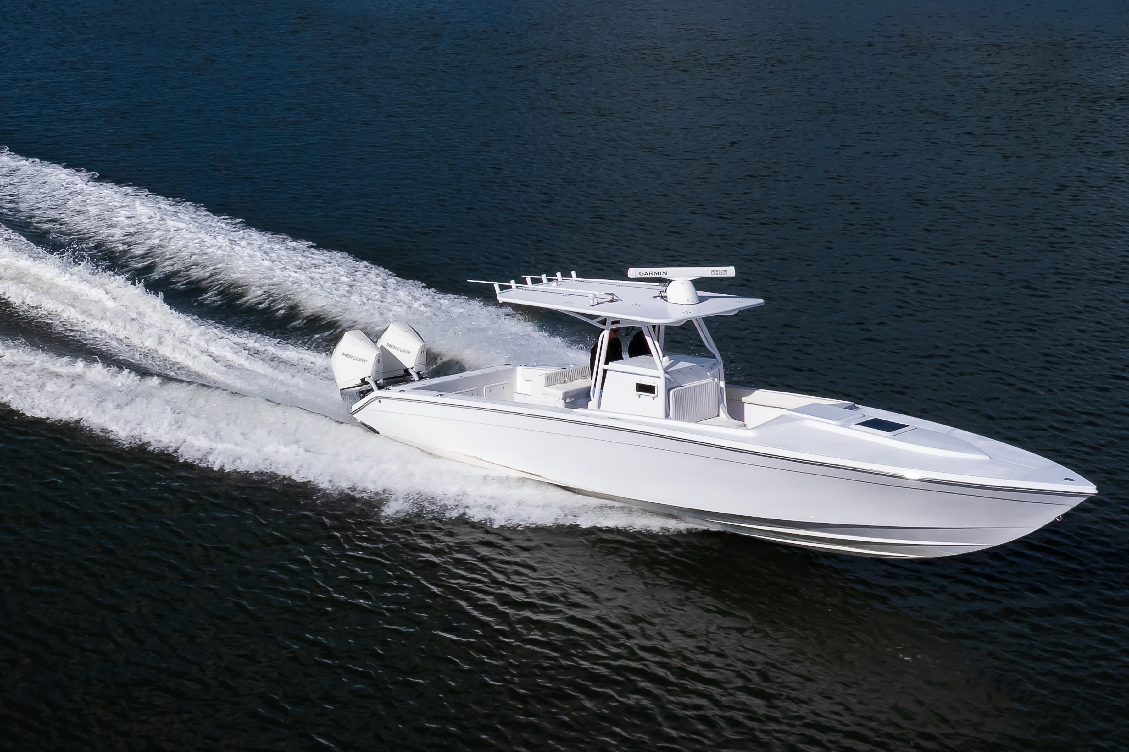 1997 Marlago 35fs boat cruising on open water, showcasing sleek design and powerful engines.