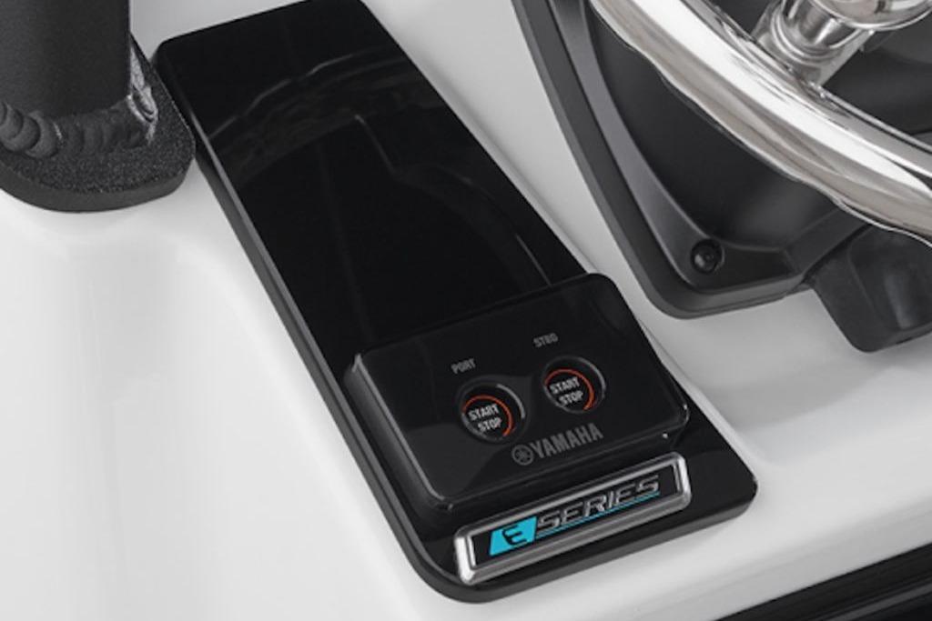 2026 Yamaha Boats 255 FSH Sport E dashboard with start/stop controls and steering wheel.