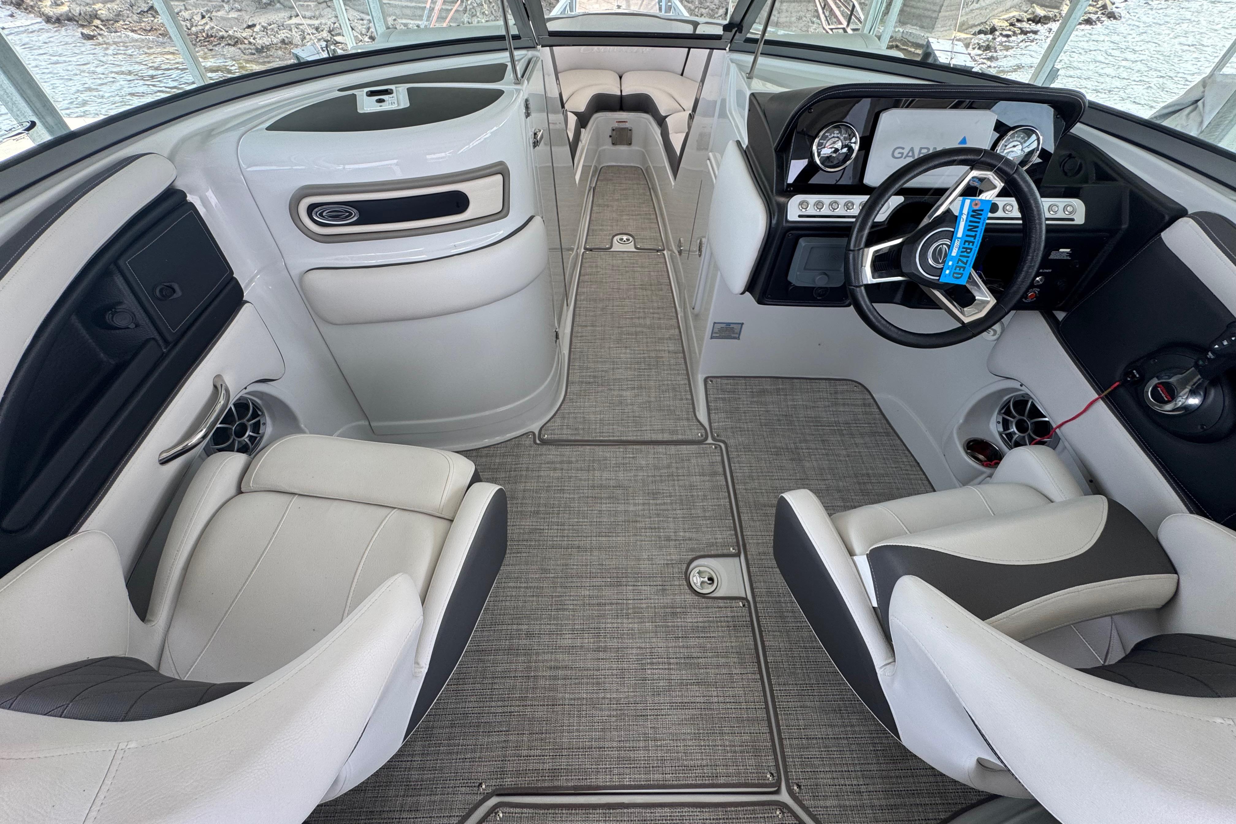 2022 Crownline 265 SS boat interior with modern dashboard and seating.