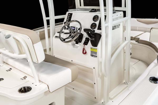 Manufacturer Provided Image: 2022 Robalo R222 Center Console boat interior with steering wheel and seating.