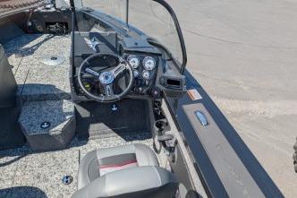 2026 Tracker Targa V-18 WT boat interior with steering wheel and dashboard controls.