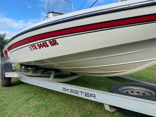 2012 Skeeter ZX200 boat on trailer, side view.
