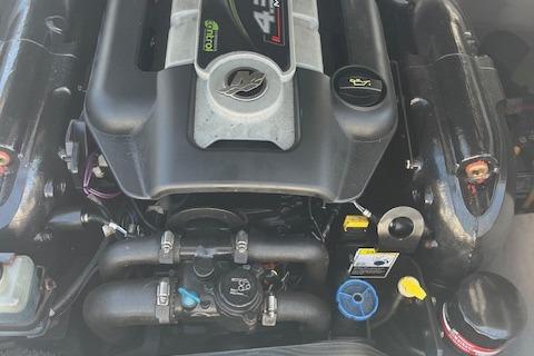 Engine of 2015 Chaparral 21 H2O Sport boat, detailed view.