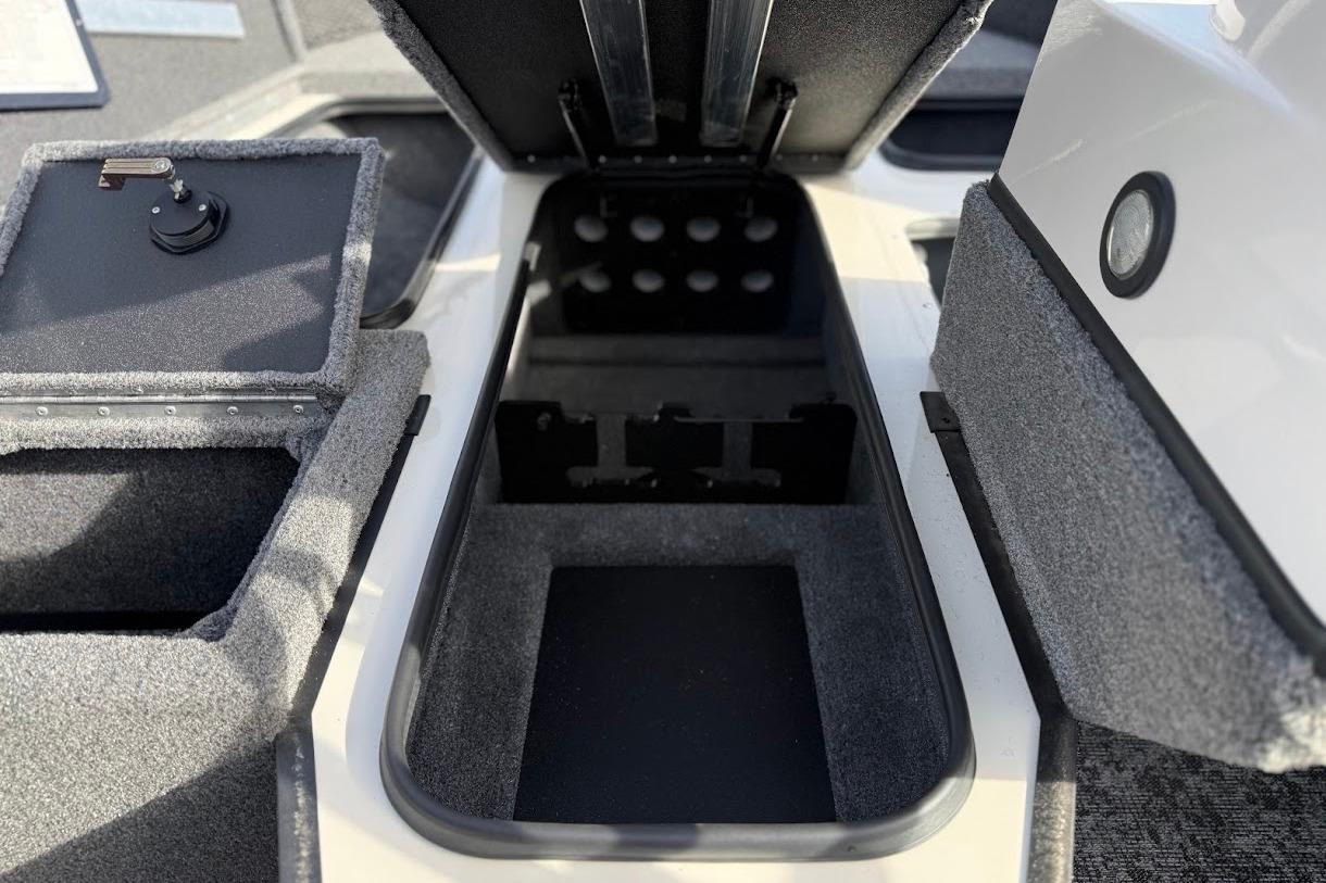 2026 Ranger VS1882SC Reata boat storage compartments with carpeted interiors.
