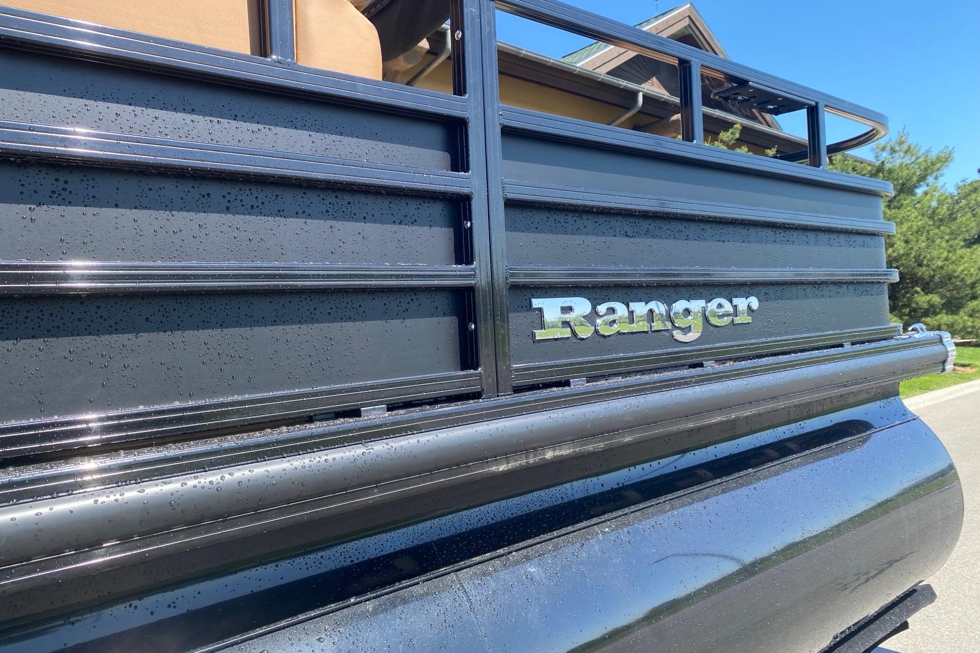 2026 Ranger 223F boat with sleek black exterior and visible branding.