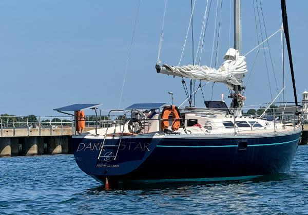 1983 O'Day 39 sailboat "Dark Star" docked in calm waters.