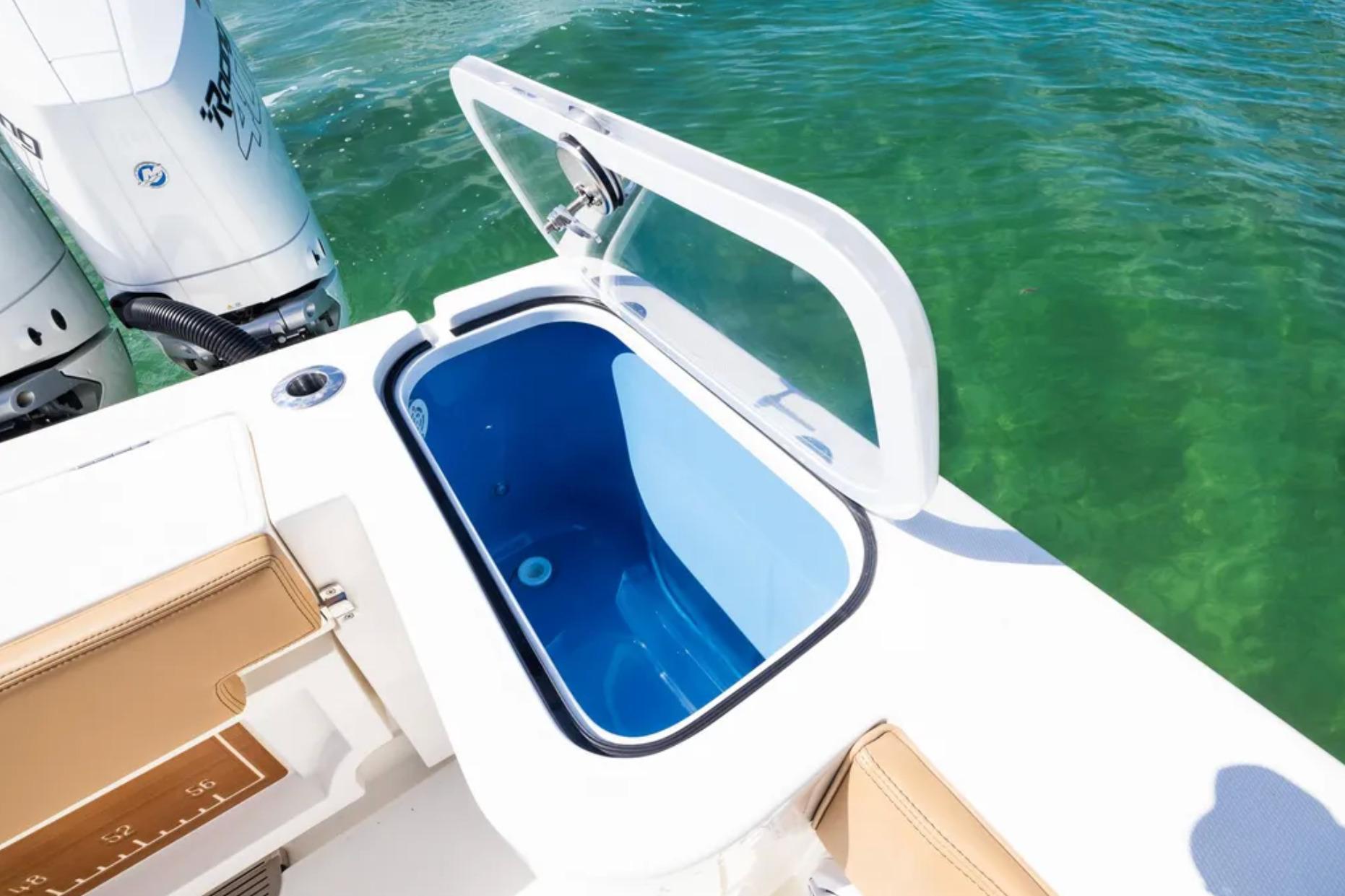 Open livewell on 2025 Blackwater 41 Performance Fish boat, with clear water background.
