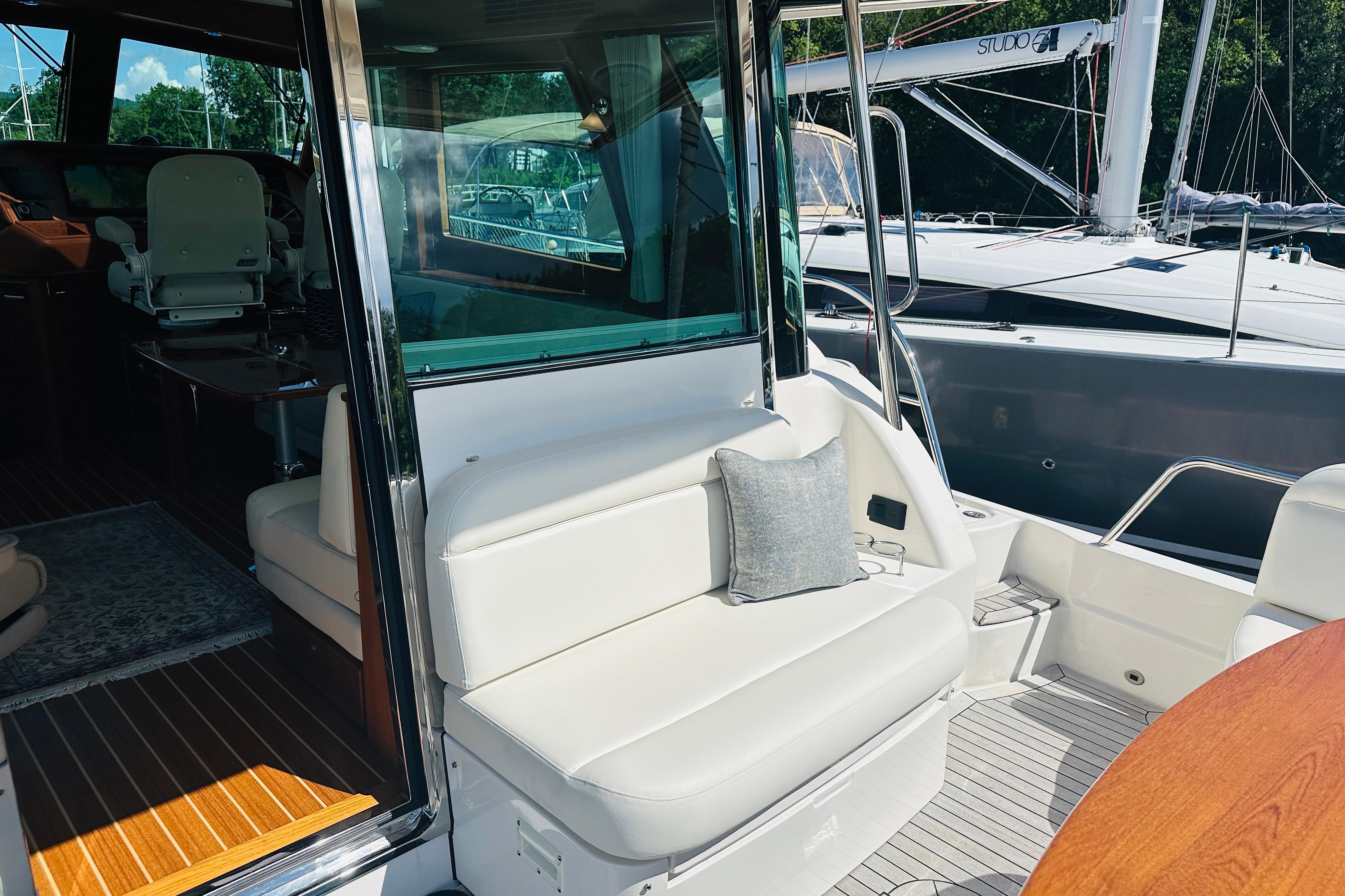 2025 Sabre 48 Salon Express yacht interior with plush seating and elegant design.