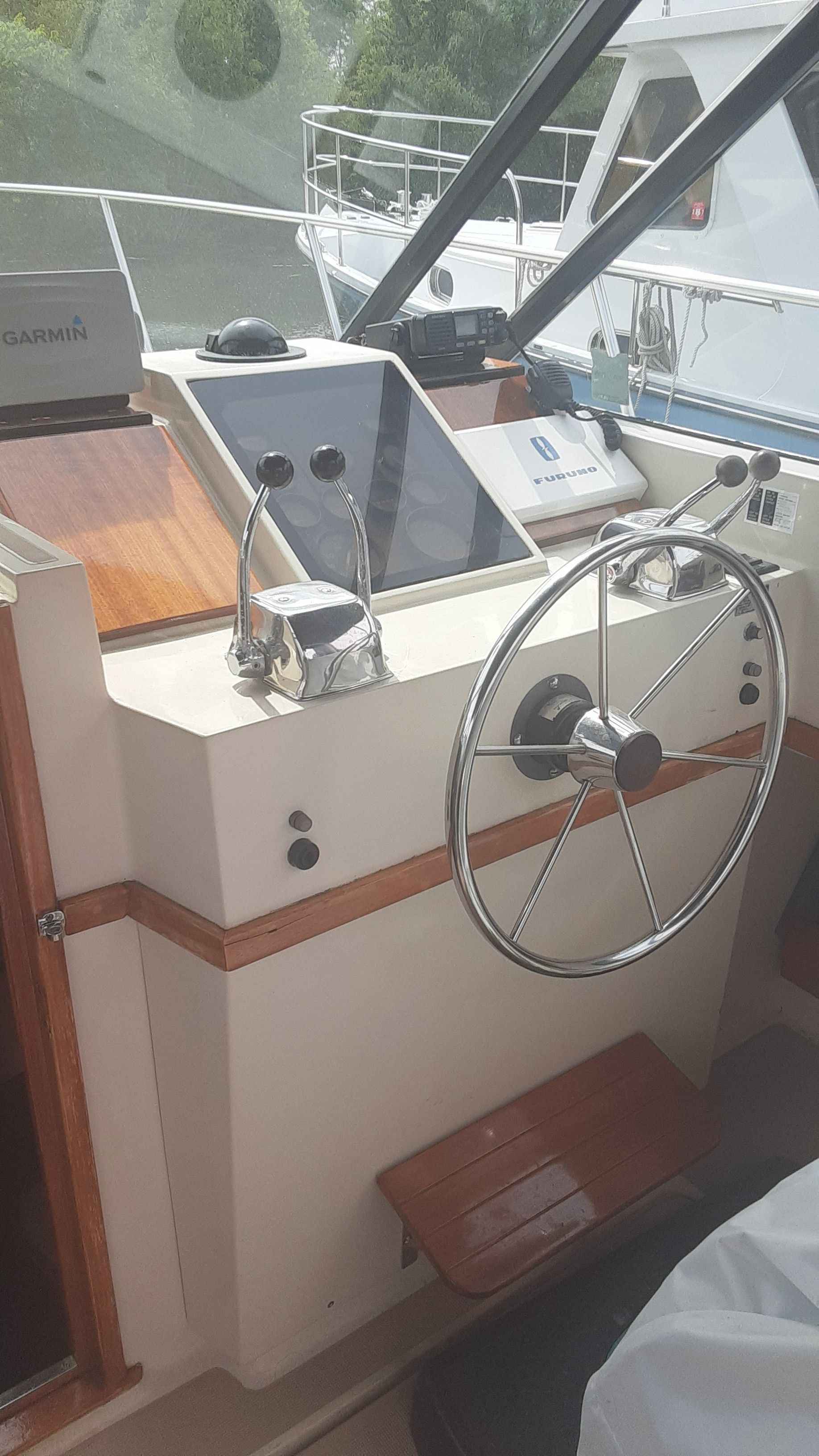 Helm of a 1985 Tiara Yachts 3100 Open boat.