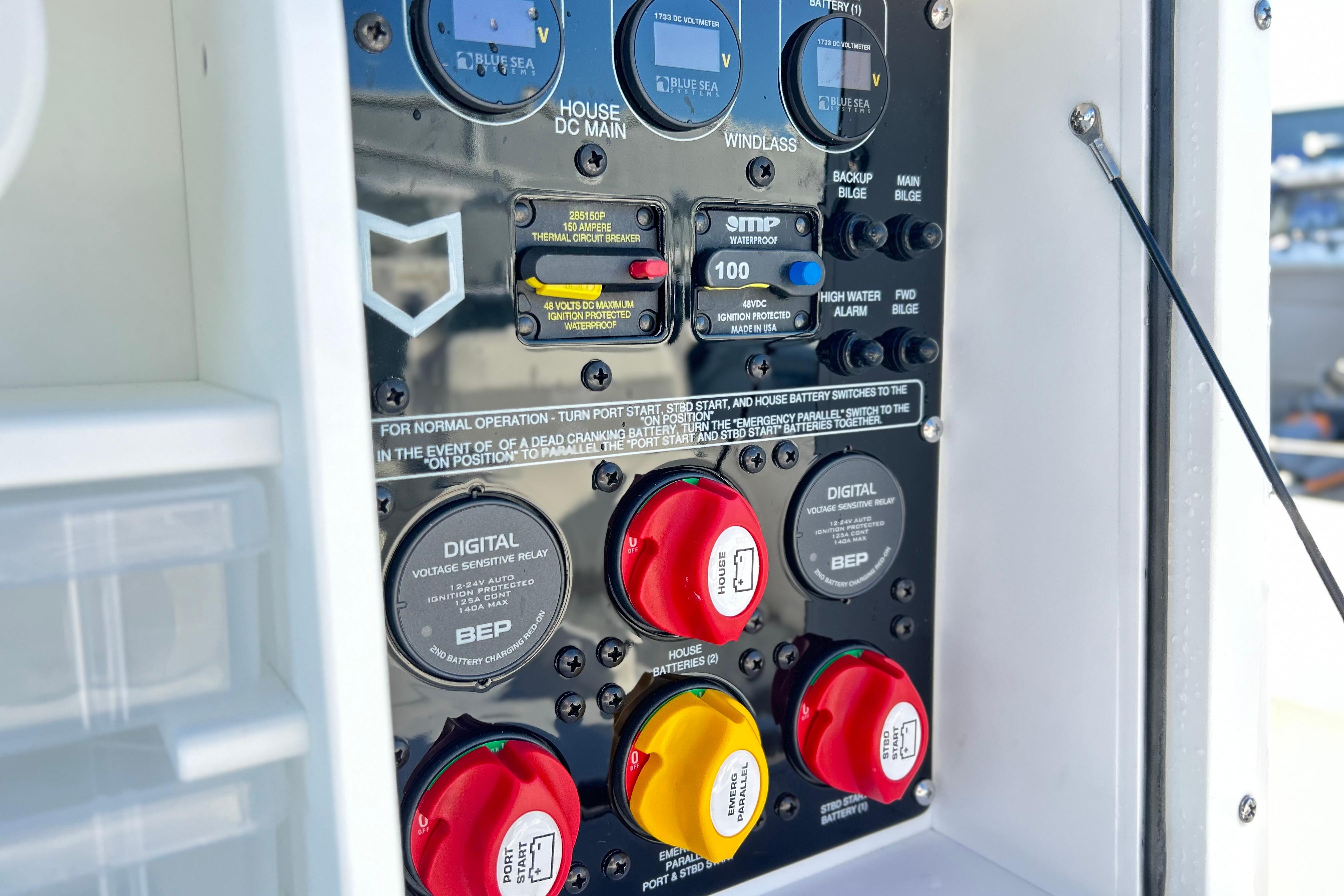 Control panel of 2026 Sea Fox 288 Commander boat with switches and circuit breakers.