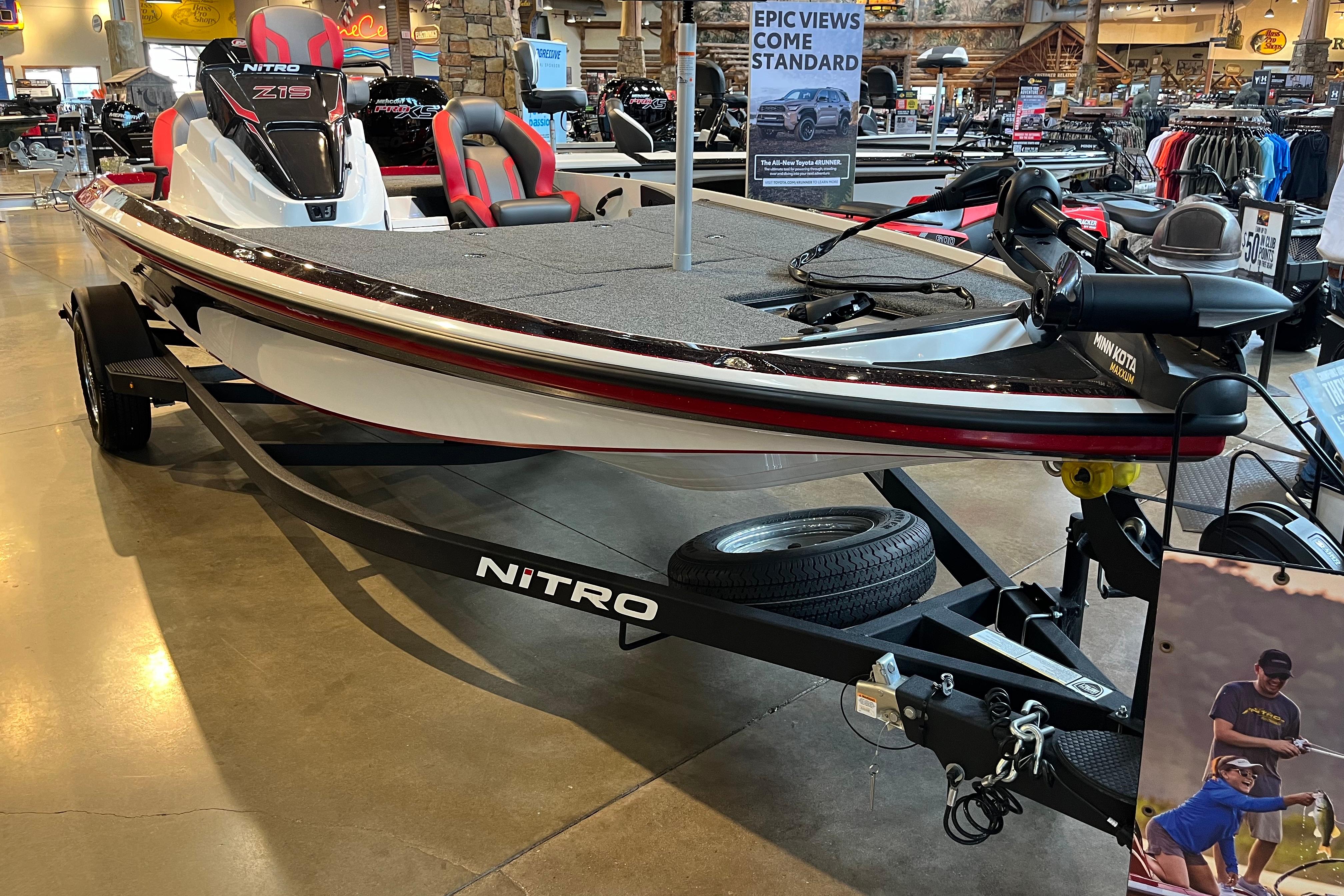 2025 Nitro Z19 boat on display in showroom with trailer.