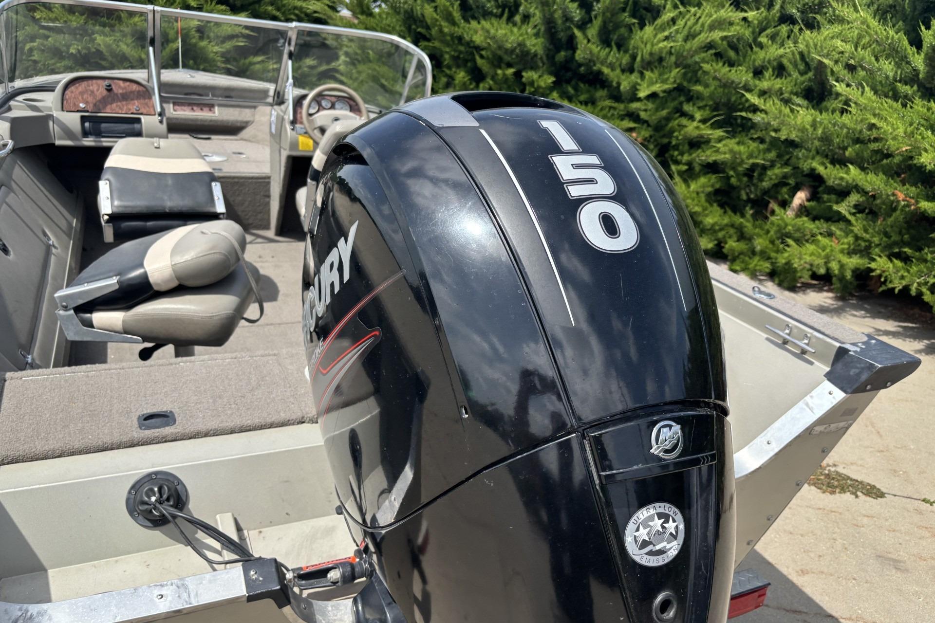 1999 Tracker Targa 18 boat with Mercury 150 outboard motor, interior view.