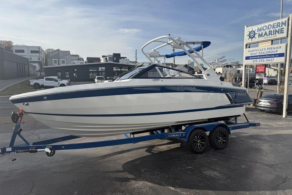 2026 Cobalt R4 Surf boat on trailer at Modern Marine dealership.