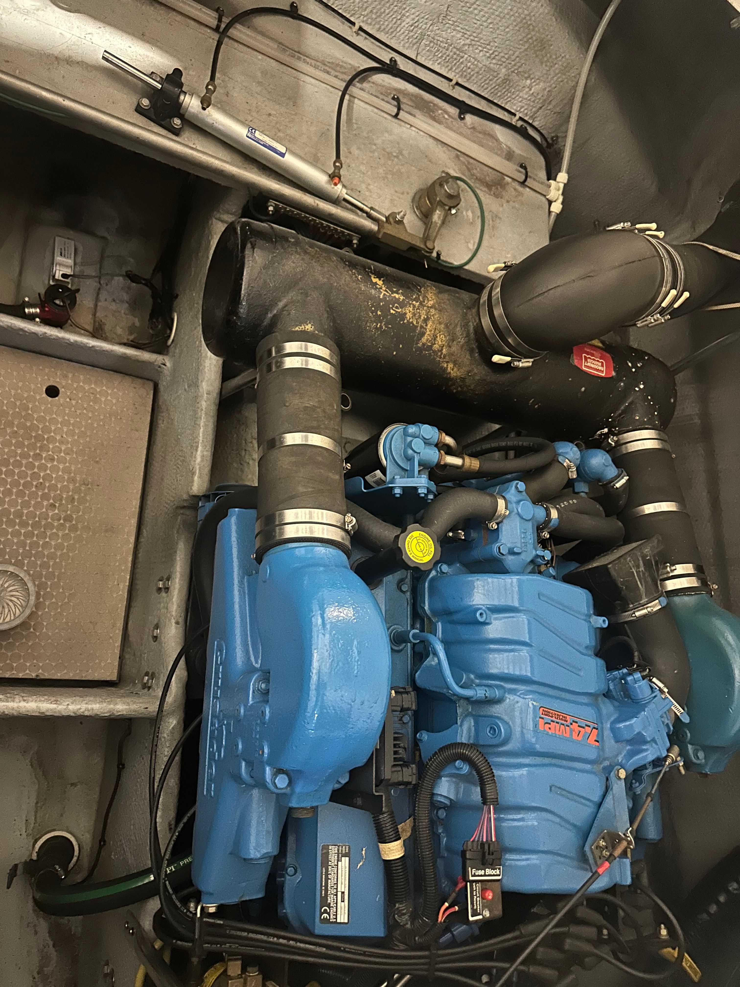 Engine compartment of a 2000 Silverton 351 Sedan with blue engine.