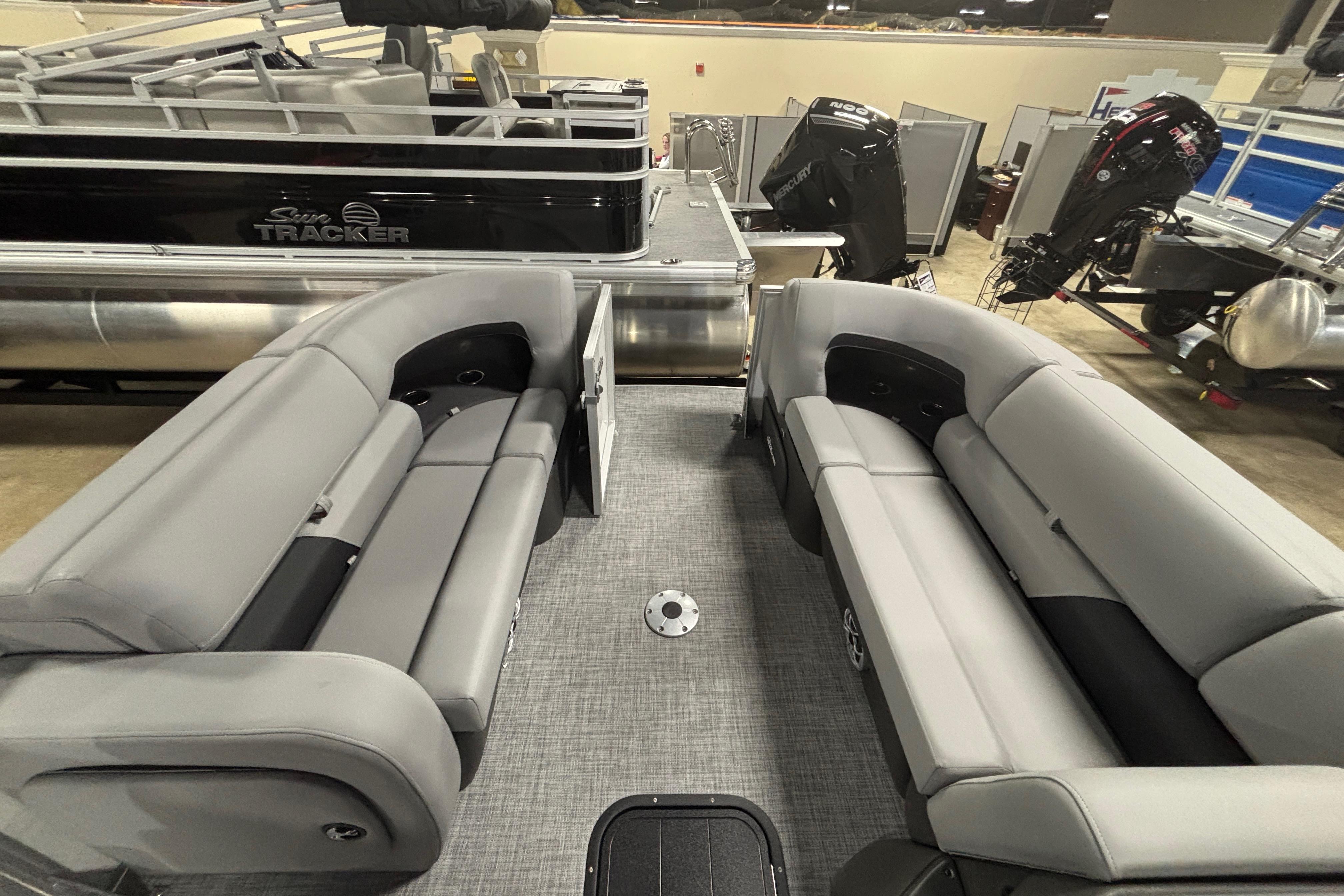 2026 Sun Tracker Party Barge 22 RF XP3 interior with gray seating and spacious layout.