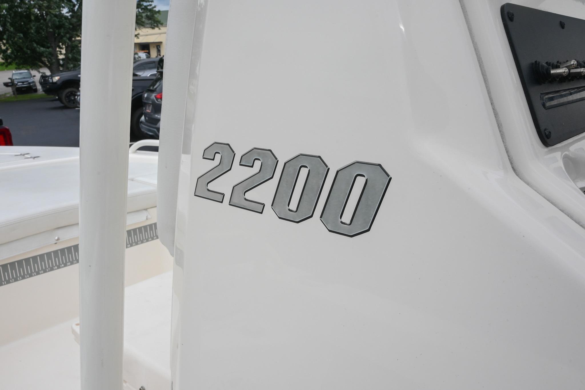 Close-up of 2021 Pathfinder 2200 TRS boat model number on white surface.