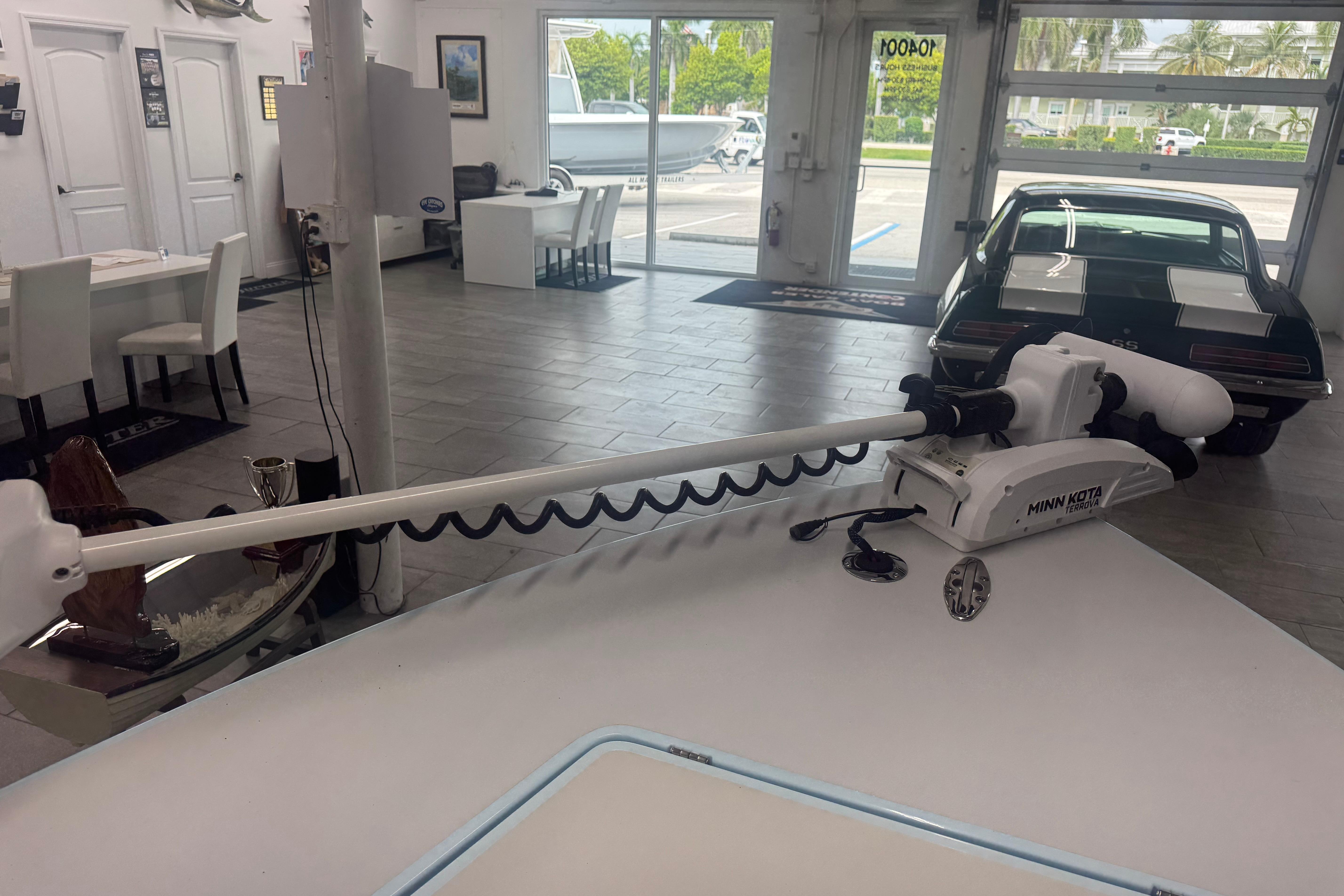 2020 Maverick Mirage 18 HPX-V boat with Minn Kota trolling motor in showroom.