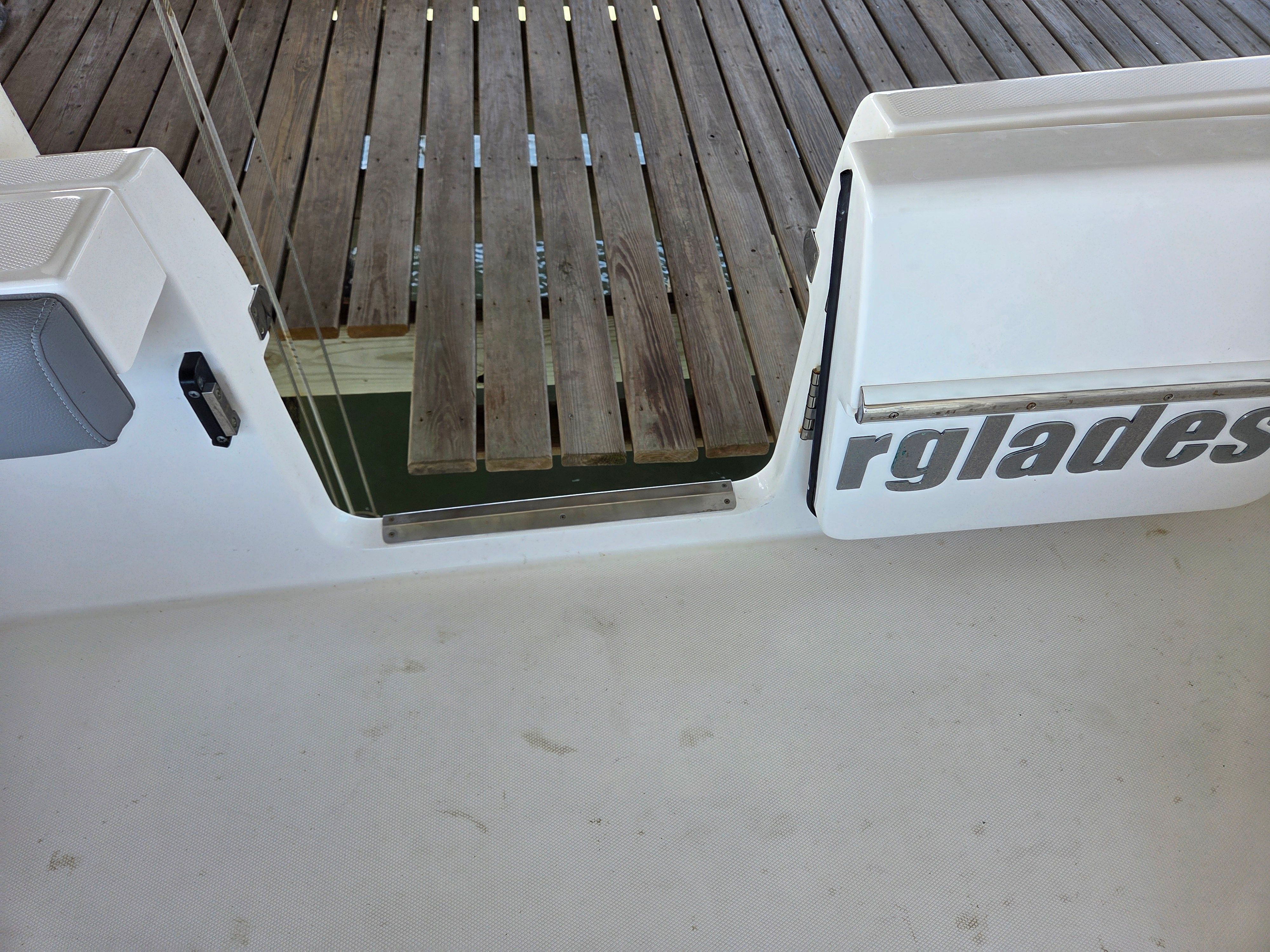 The image shows the stern of a 2017 Everglades 355 Center Console boat.