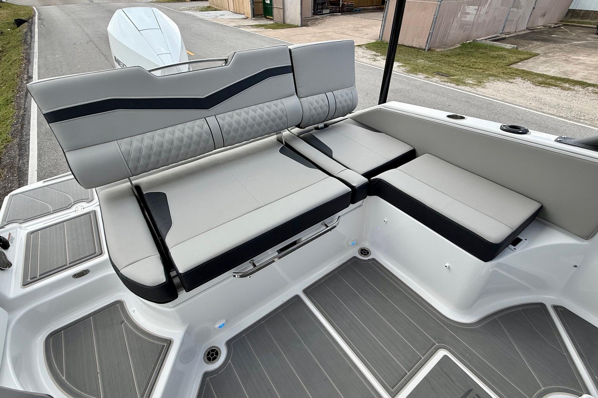 2026 Monterey Elite 25 OB boat interior with sleek seating and modern design.
