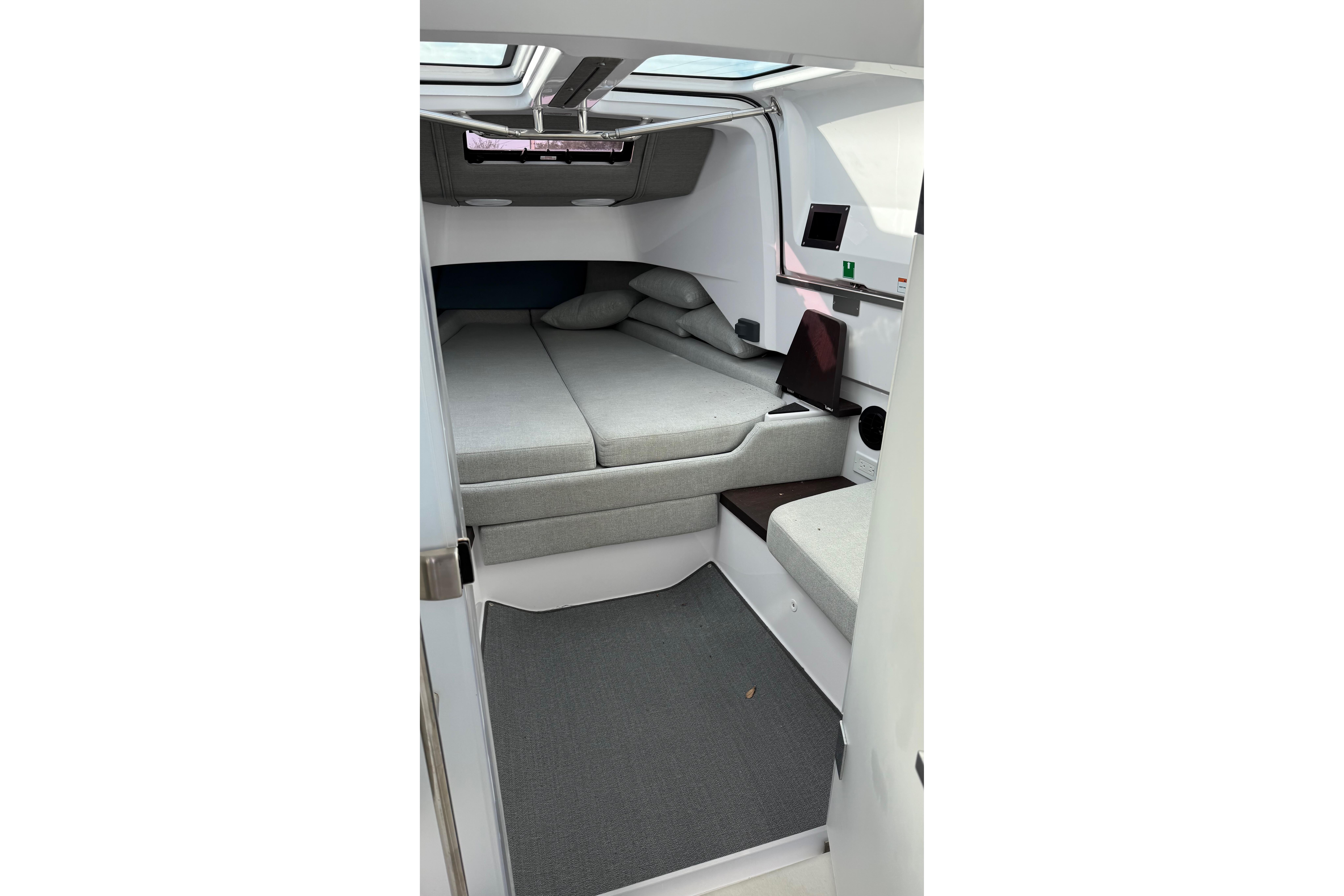 Interior cabin of 2023 Axopar 37 XC CROSS CABIN with modern design and comfortable seating.