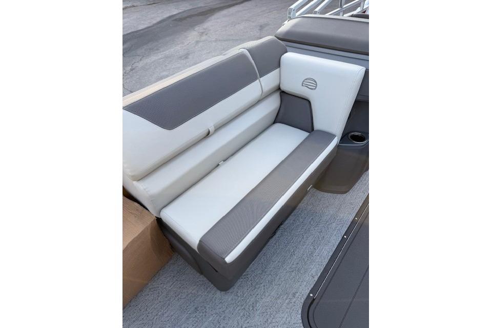 2026 Sun Tracker Fishin' Barge 22 XP3, gray and white seating detail.
