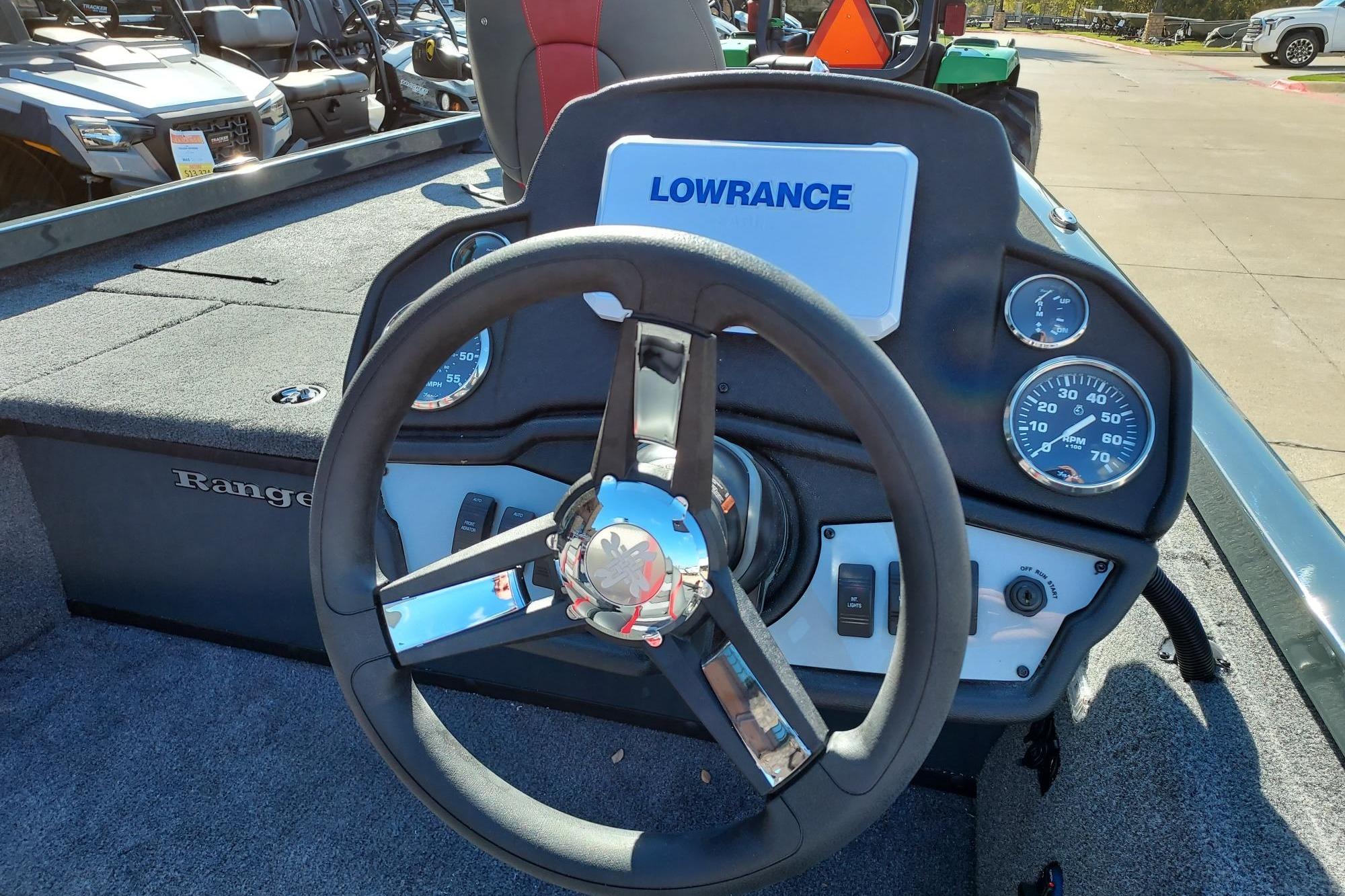 2026 Ranger RT178C boat dashboard with steering wheel and Lowrance display.