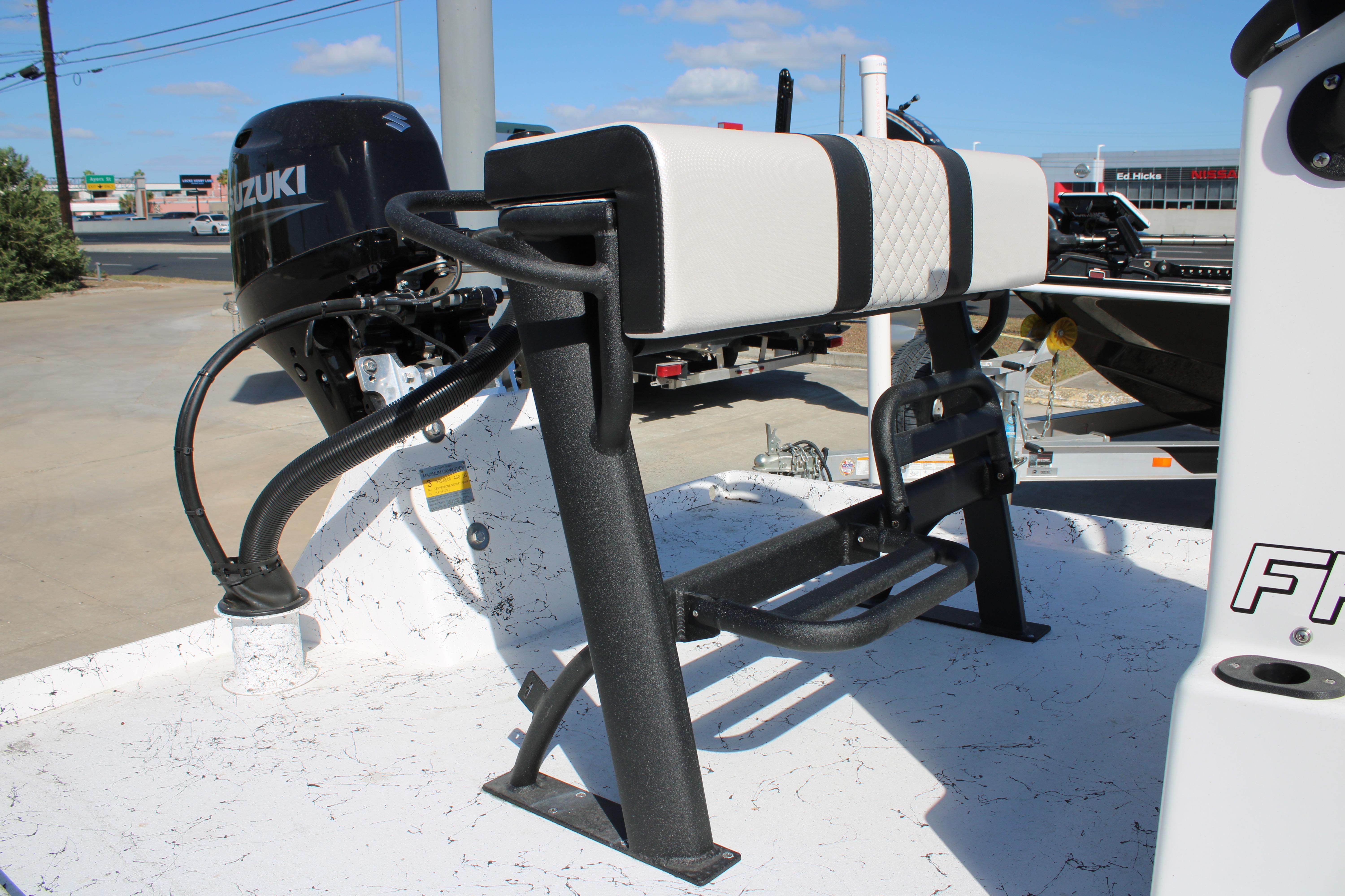 2026 Freedom Boats Chiquita with Suzuki outboard motor, featuring a sturdy bench seat.