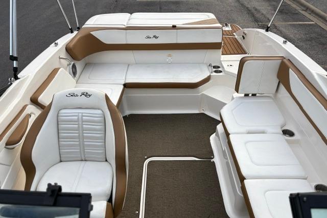 2017 Searay SPX210 boat interior with white and brown seating, spacious layout.